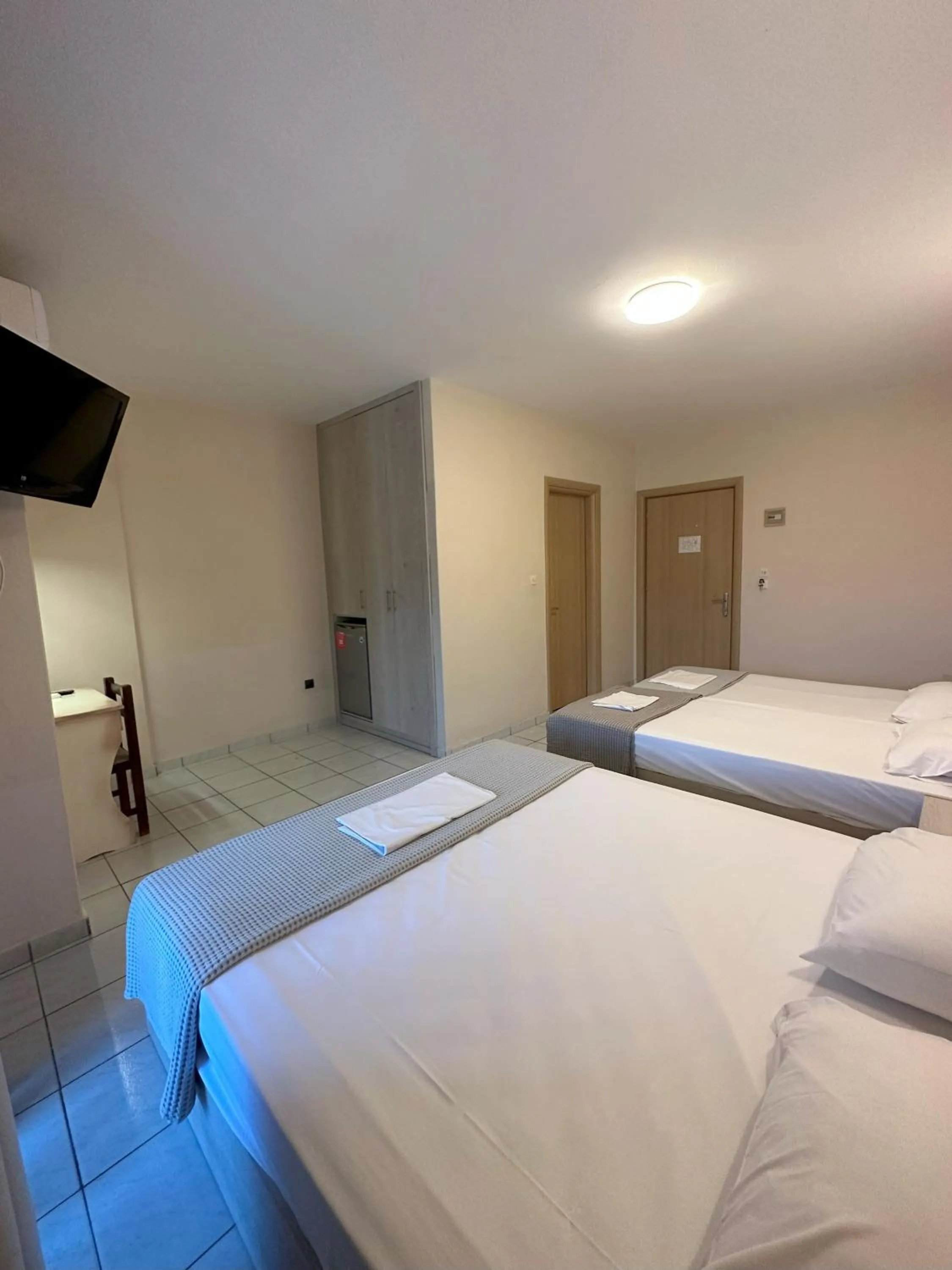 Bed in Hotel Afrodite