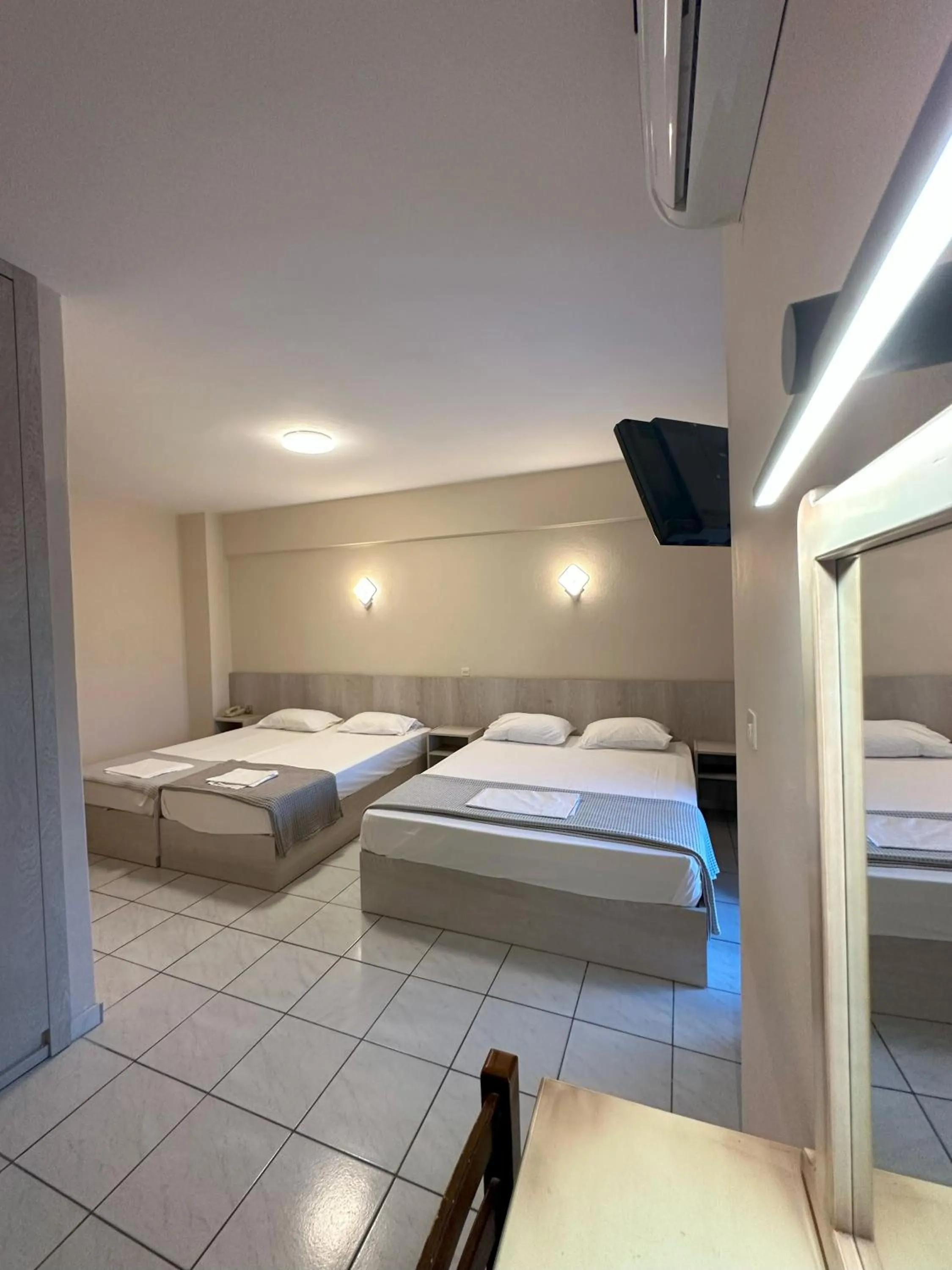 Bed in Hotel Afrodite