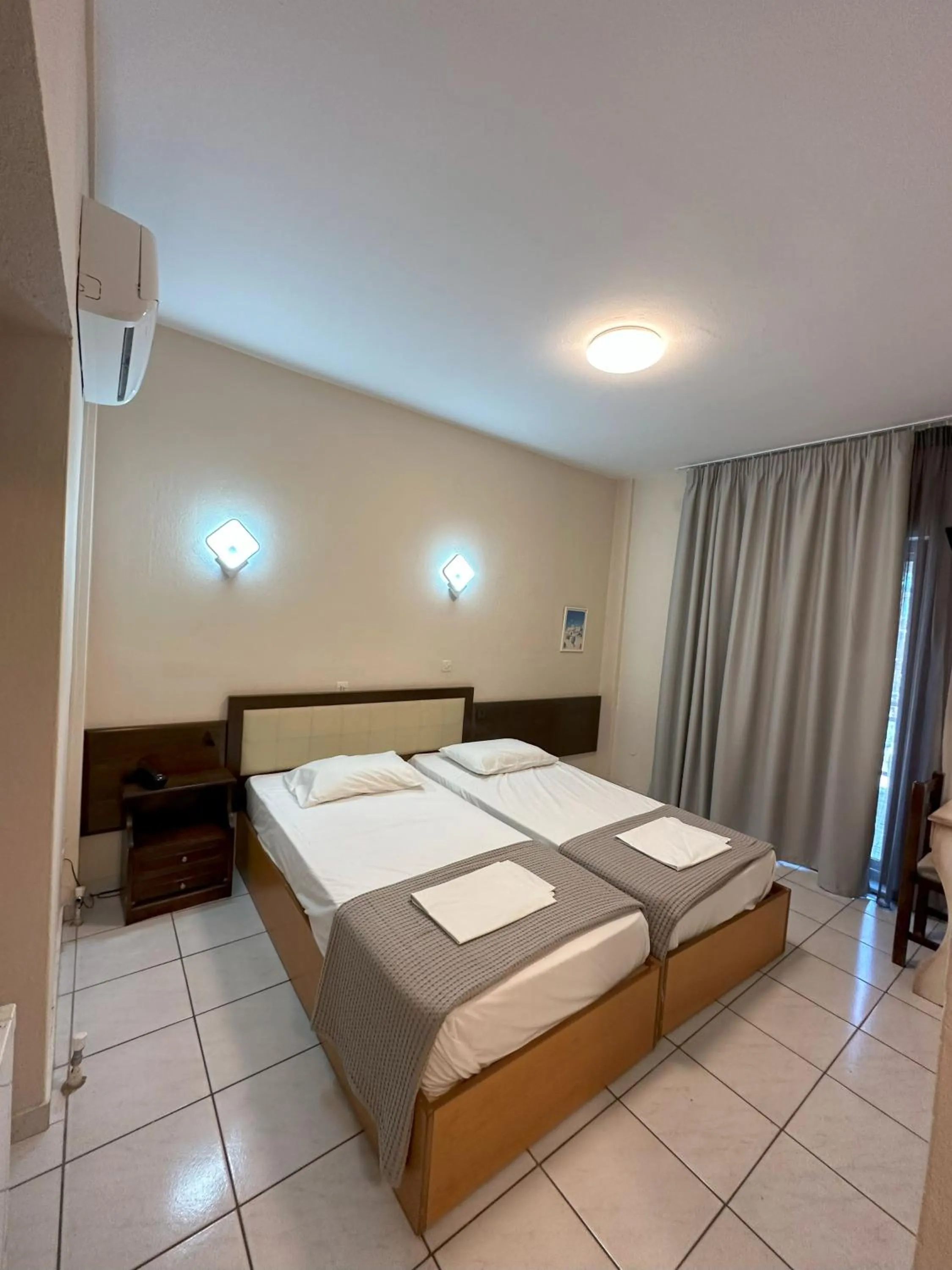 Bed in Hotel Afrodite