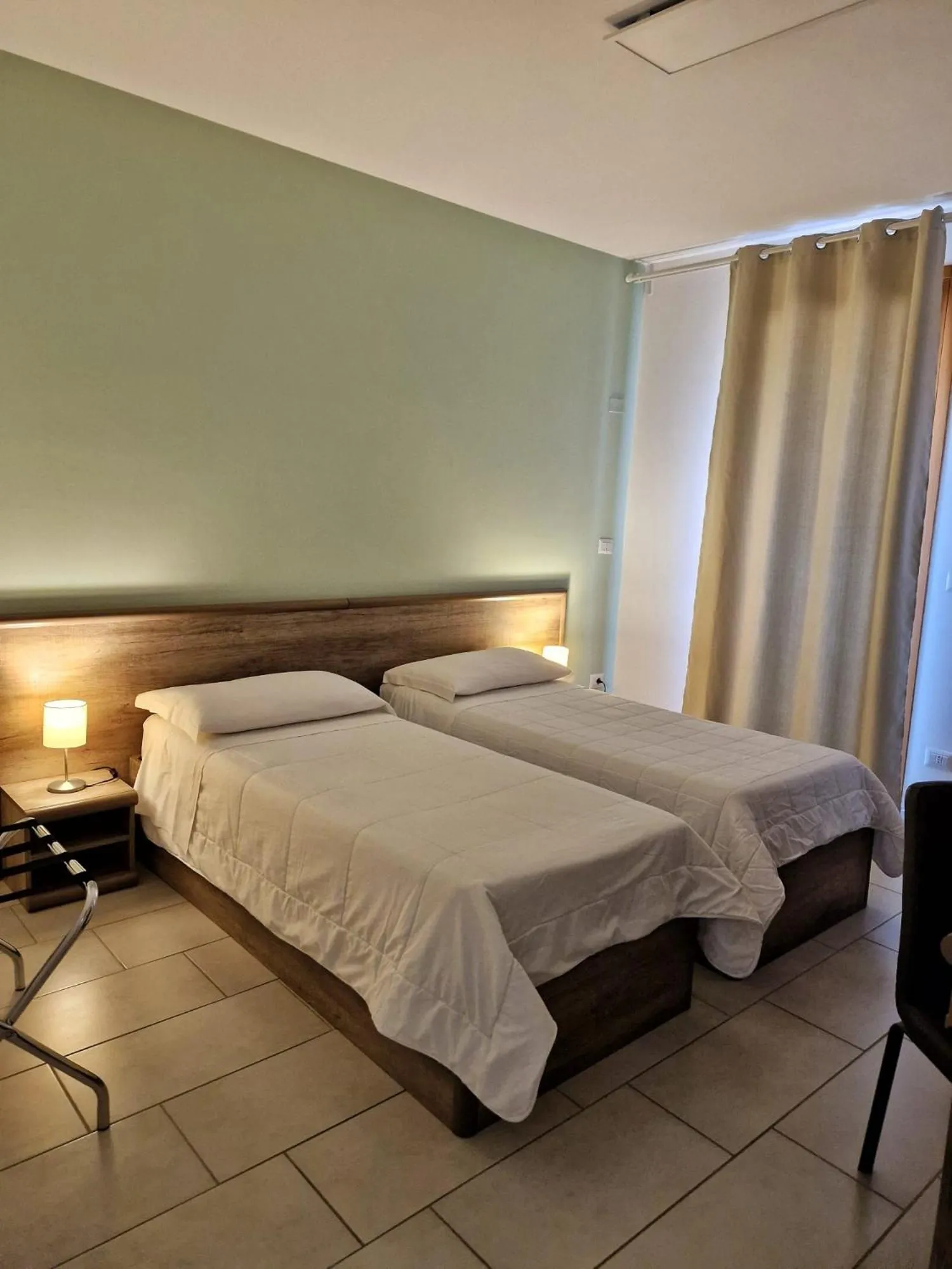 Bed in Mansio Residence & Hotel