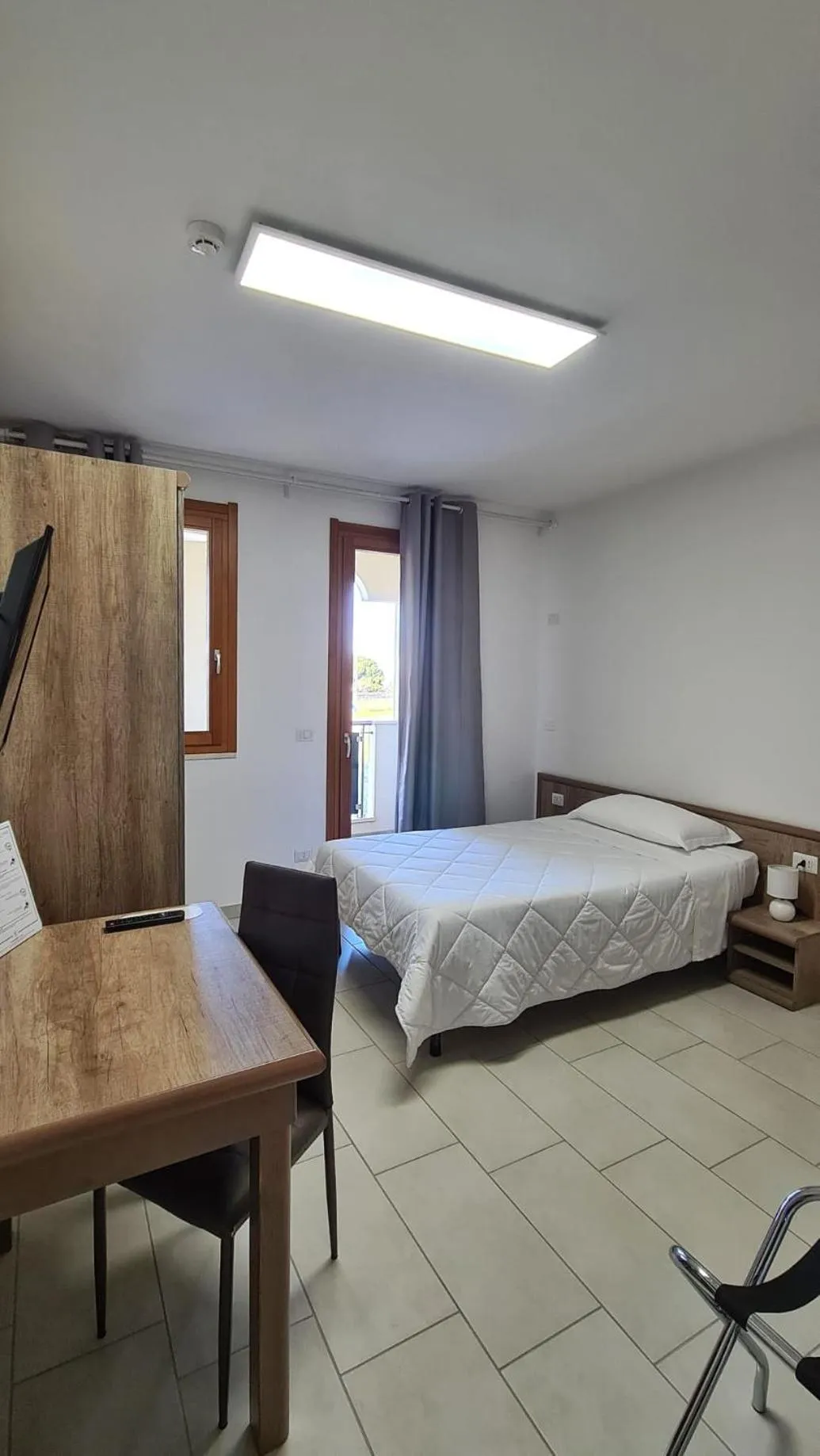 Bed in Mansio Residence & Hotel