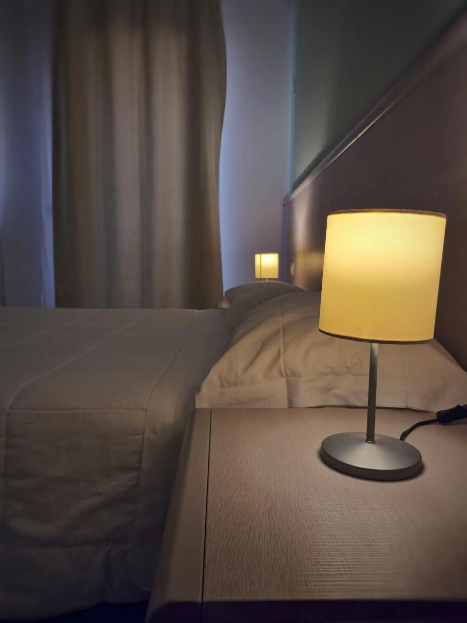 Bed in Mansio Residence & Hotel