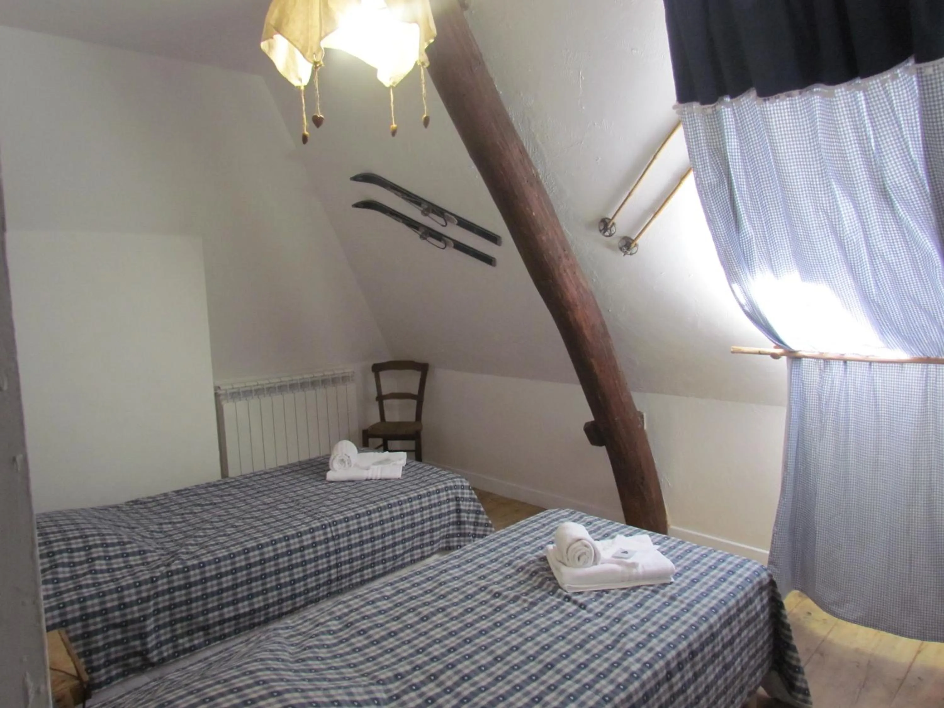 Bed in Le domaine des 3 marmottes Chambres d' hôtes