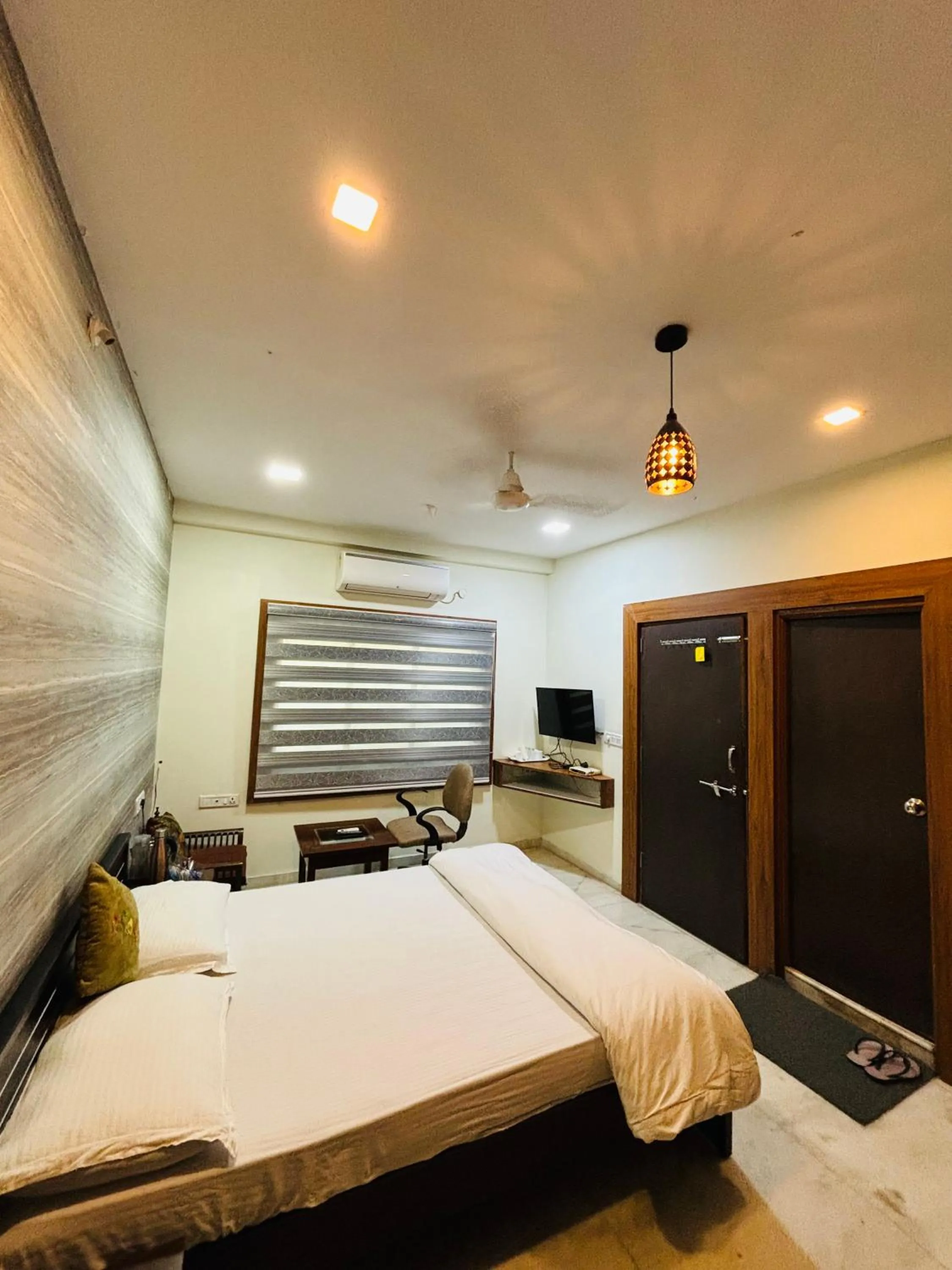 Bed in Royal Palms Luxury Service Apartment