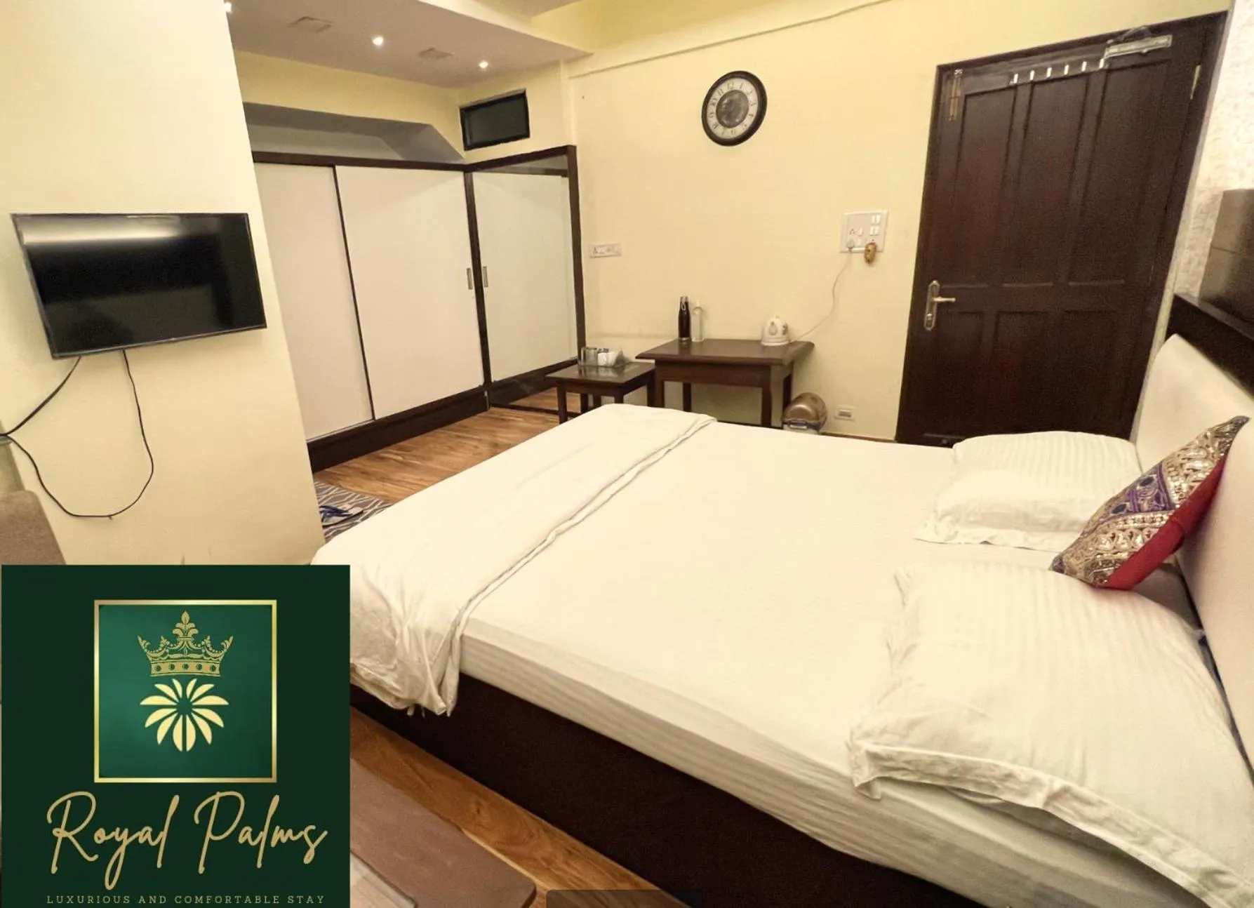 Bed in Royal Palms Luxury Service Apartment