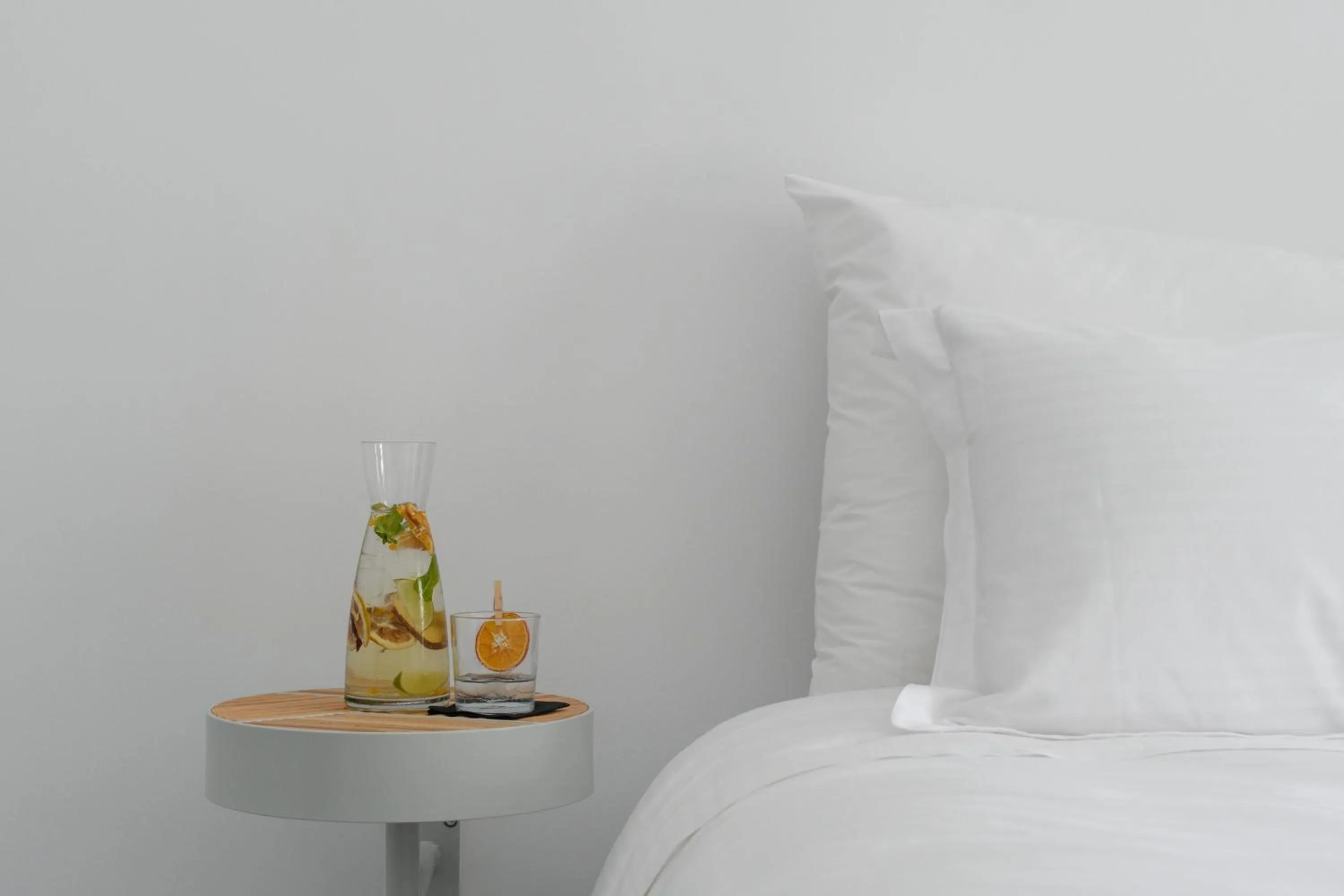 Bedroom, Bed in Echoes Luxury Suites