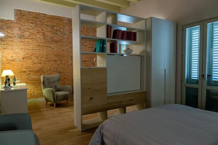 Bed in Cantine De Gregorio Suites