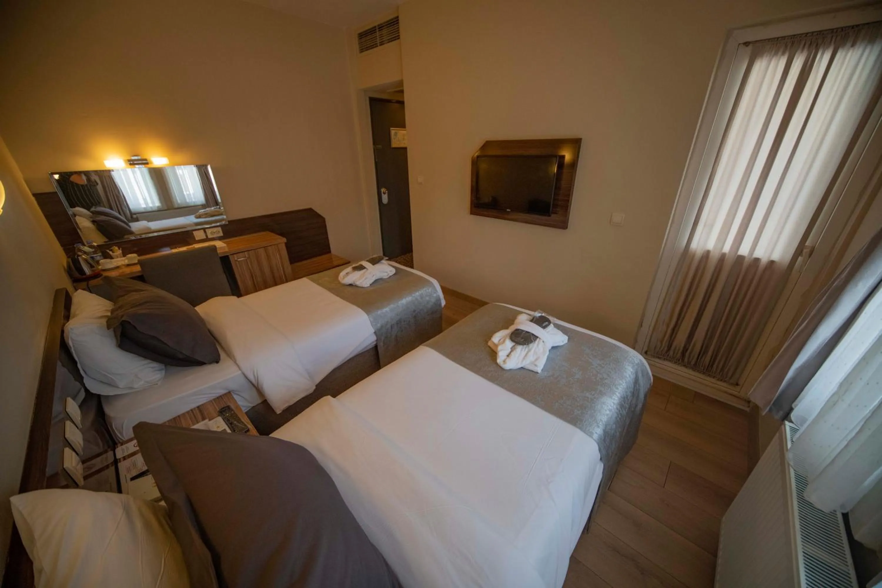 Bed in Herakles Thermal Hotel