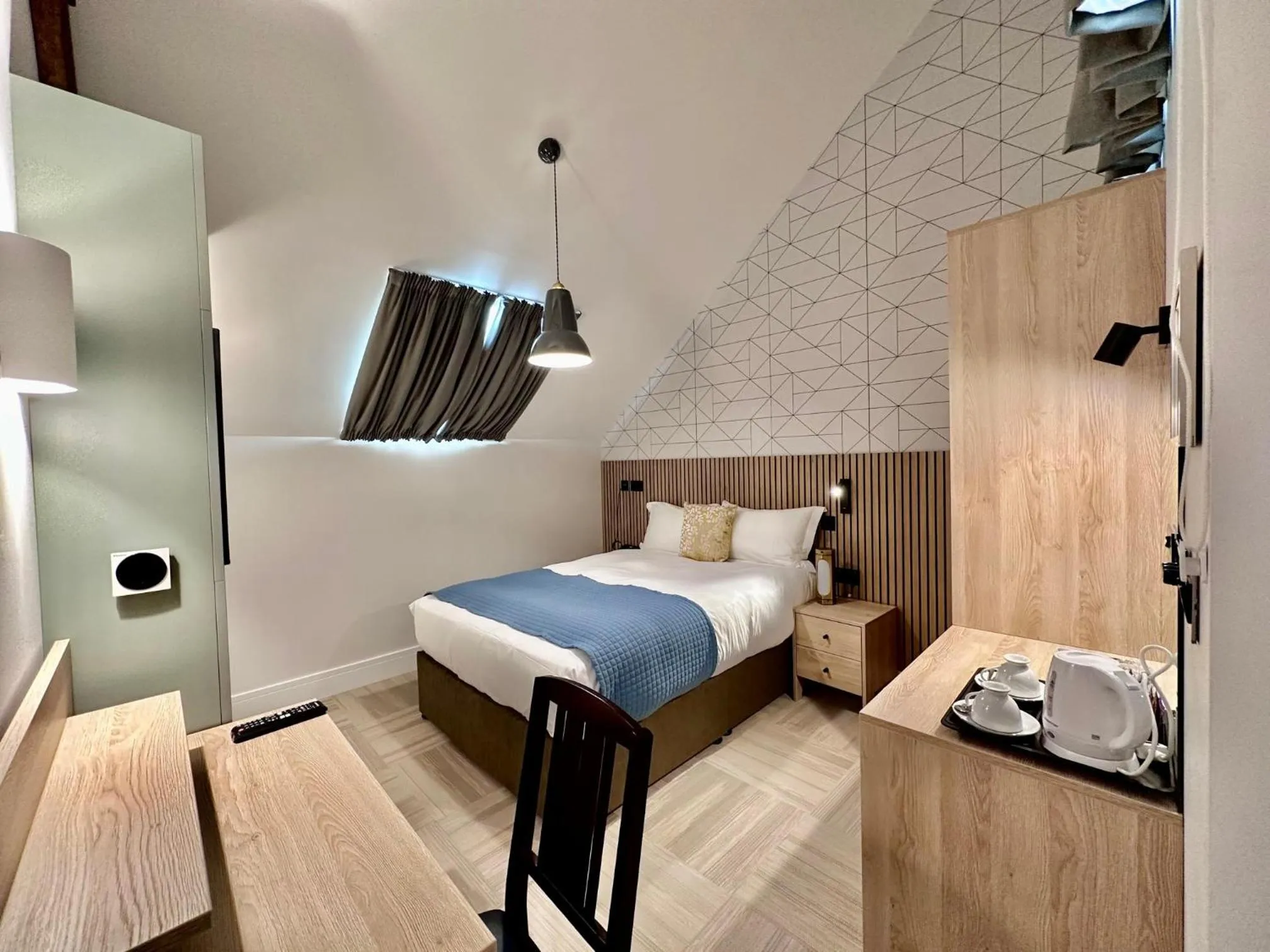 Bed in The Pillar Hotel