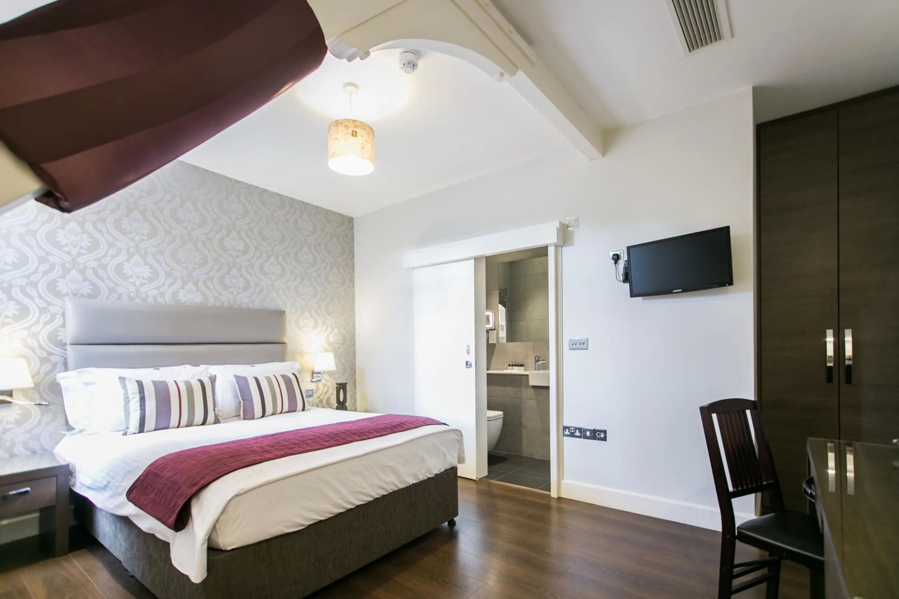 Bed in The Pillar Hotel