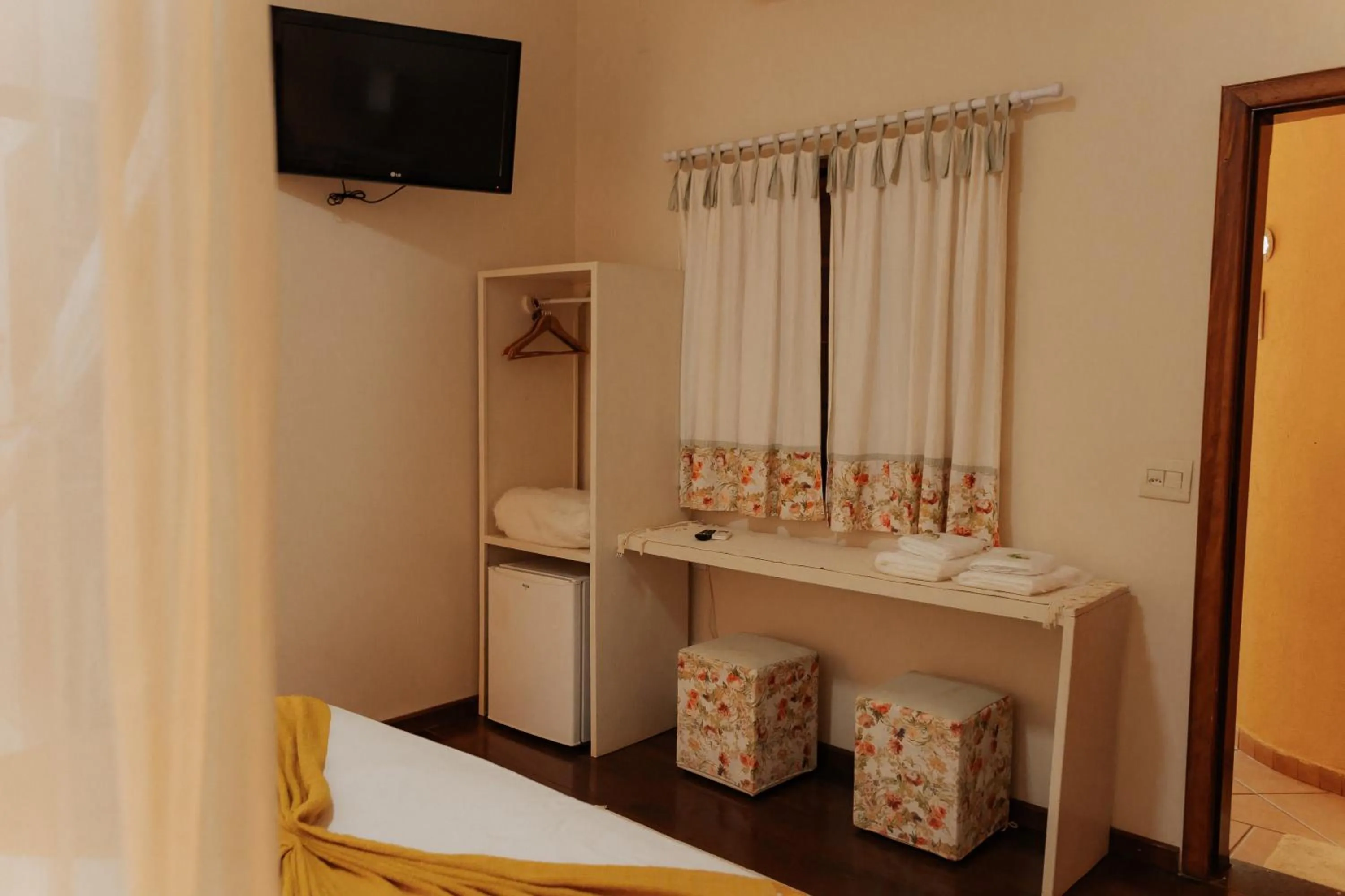 Bed in Hotel Pousada Chalé das Flores