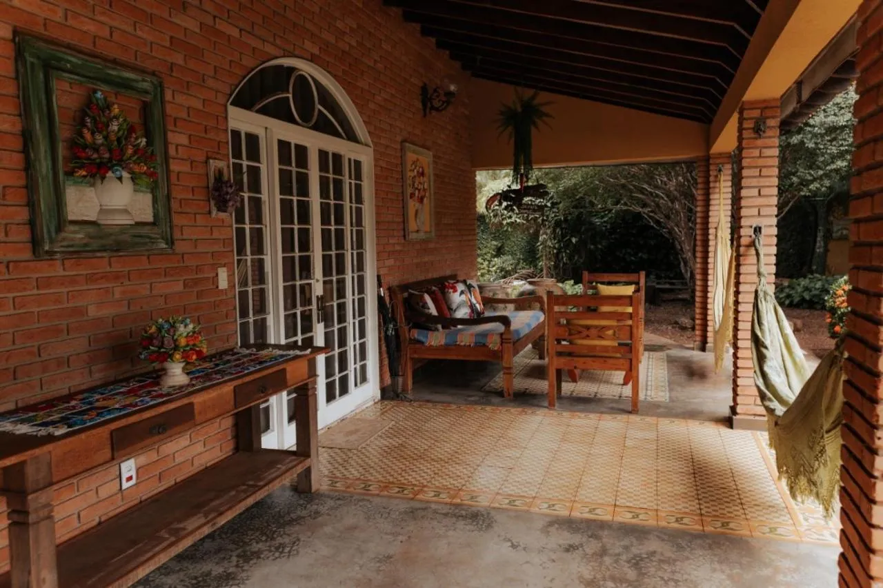TV and multimedia in Hotel Pousada Chalé das Flores