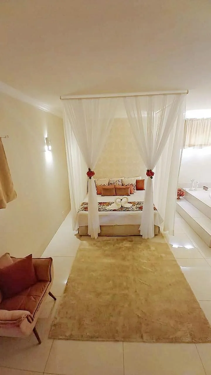 Bed in Hotel Pousada Chalé das Flores