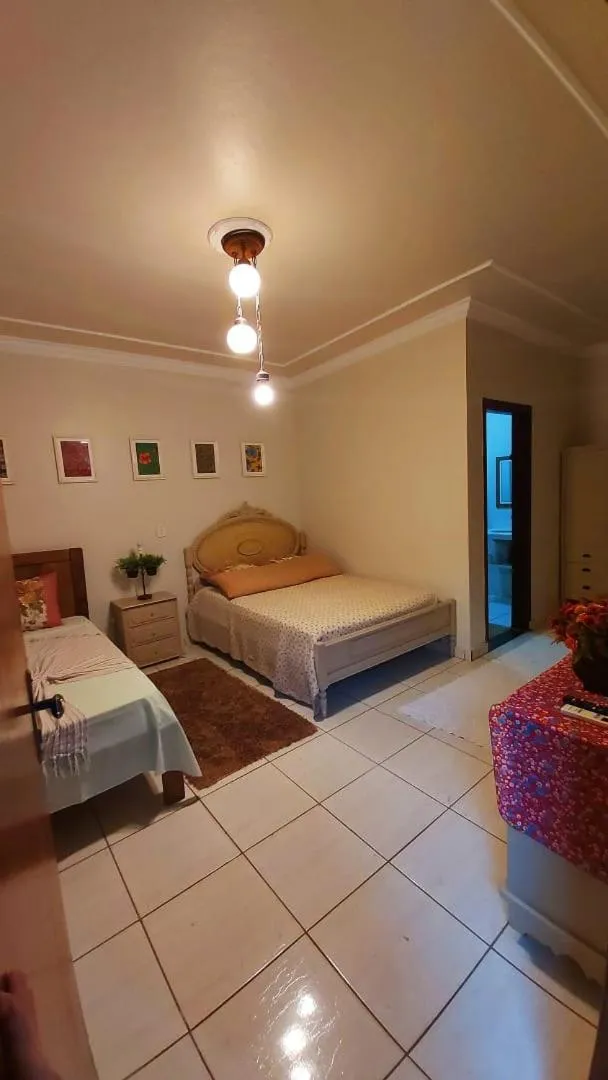 Bed in Hotel Pousada Chalé das Flores