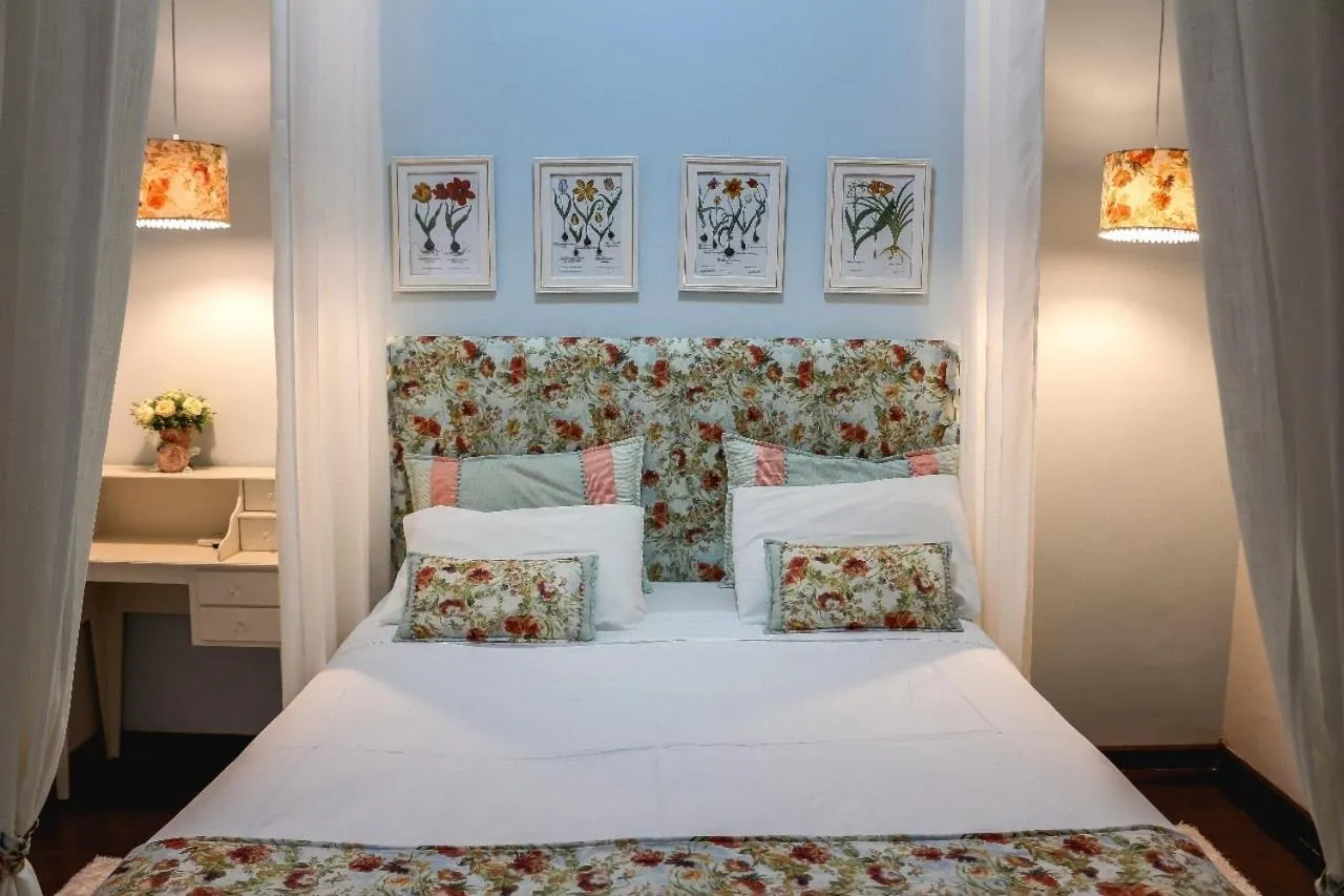 Bed in Hotel Pousada Chalé das Flores