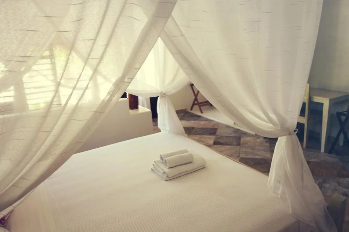Bed in Almaplena Boutique Hotel