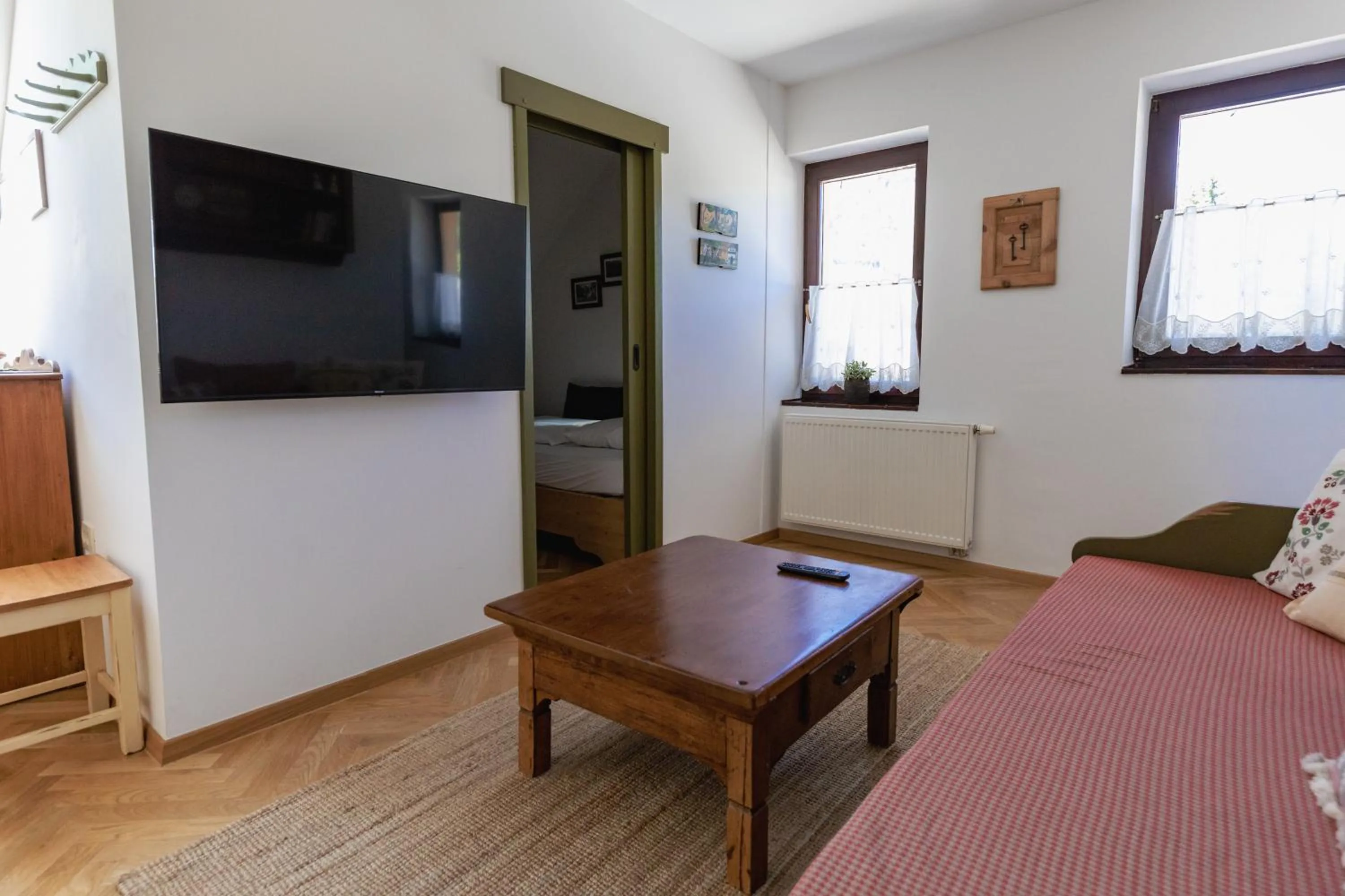 Living room, Bed in Berghi Hotel and Apartments