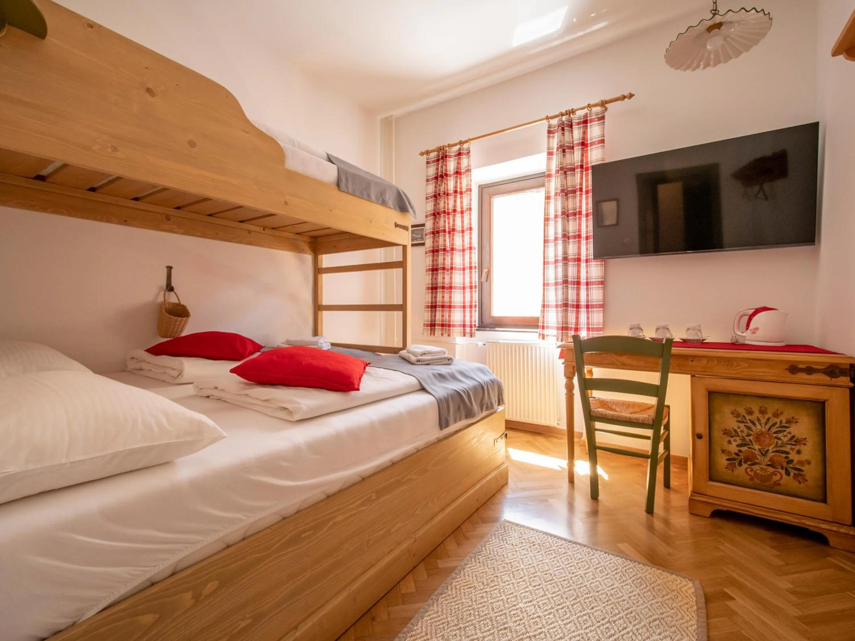 Bed in Berghi Hotel and Apartments