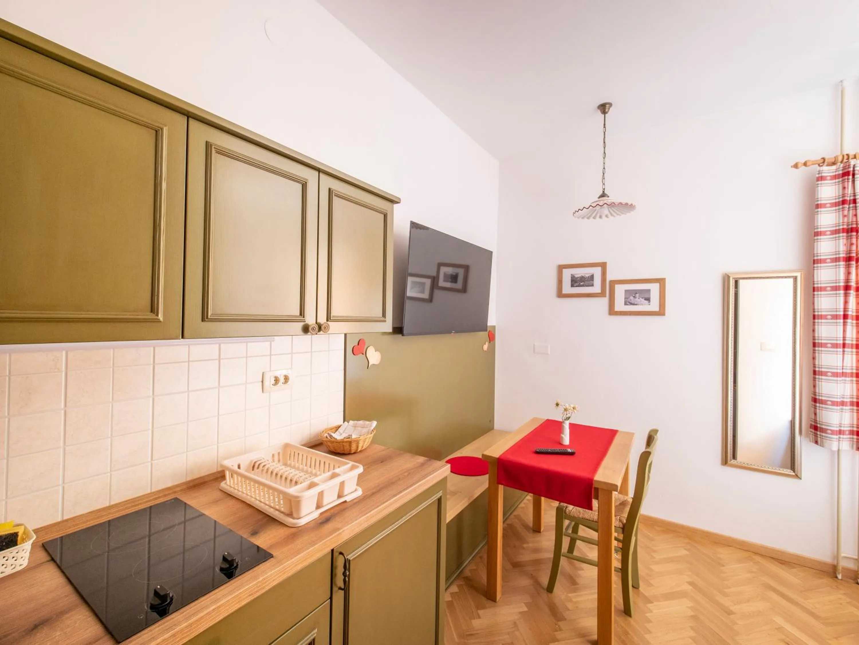 Kitchen or kitchenette in Berghi Hotel and Apartments