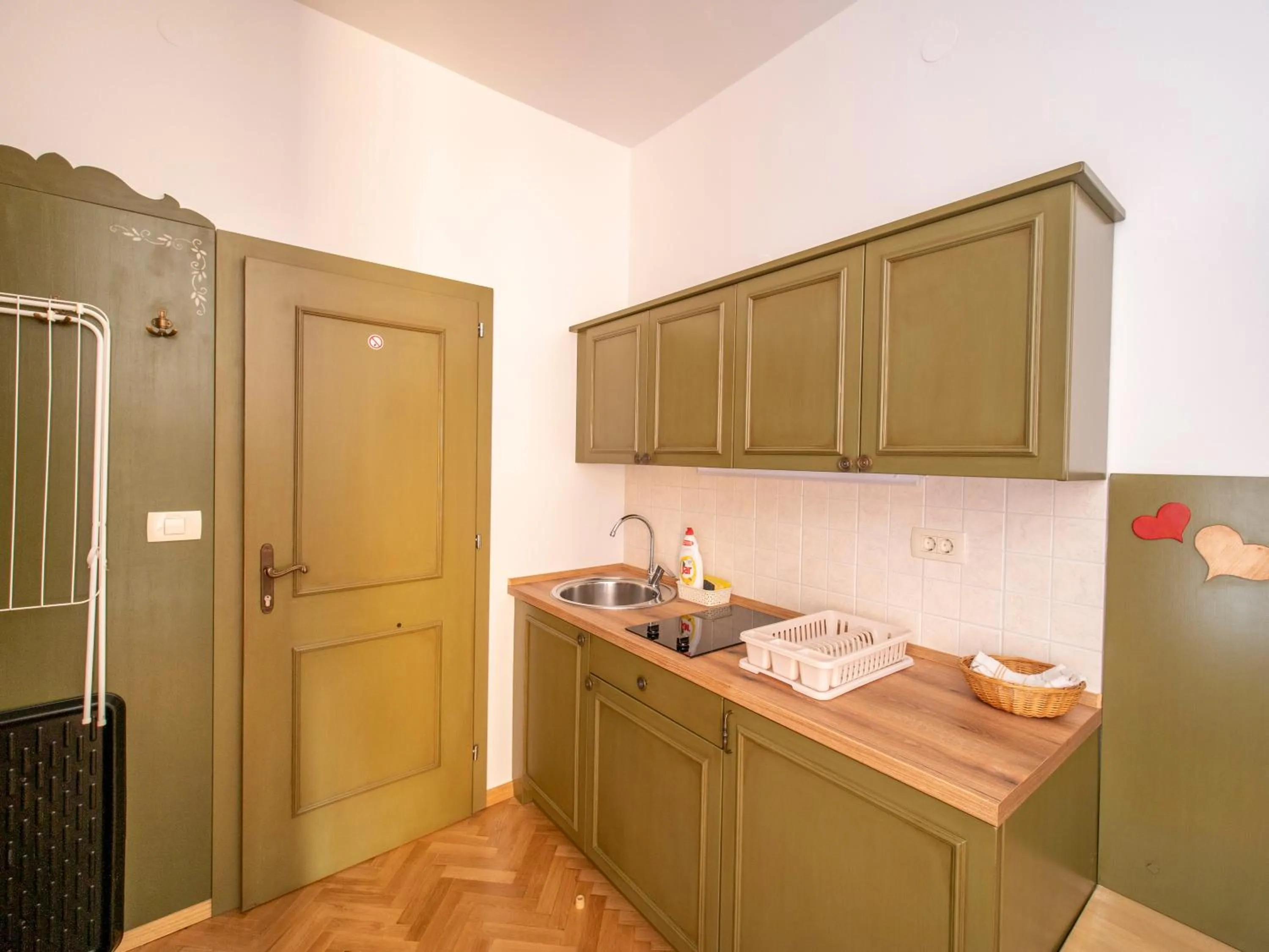 Kitchen or kitchenette in Berghi Hotel and Apartments