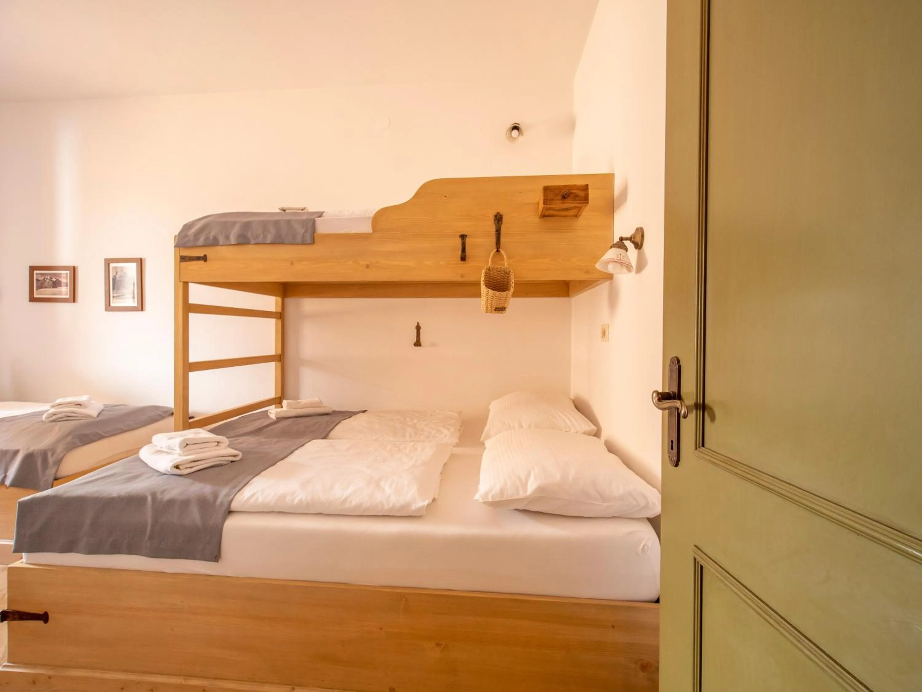 Bed in Berghi Hotel and Apartments