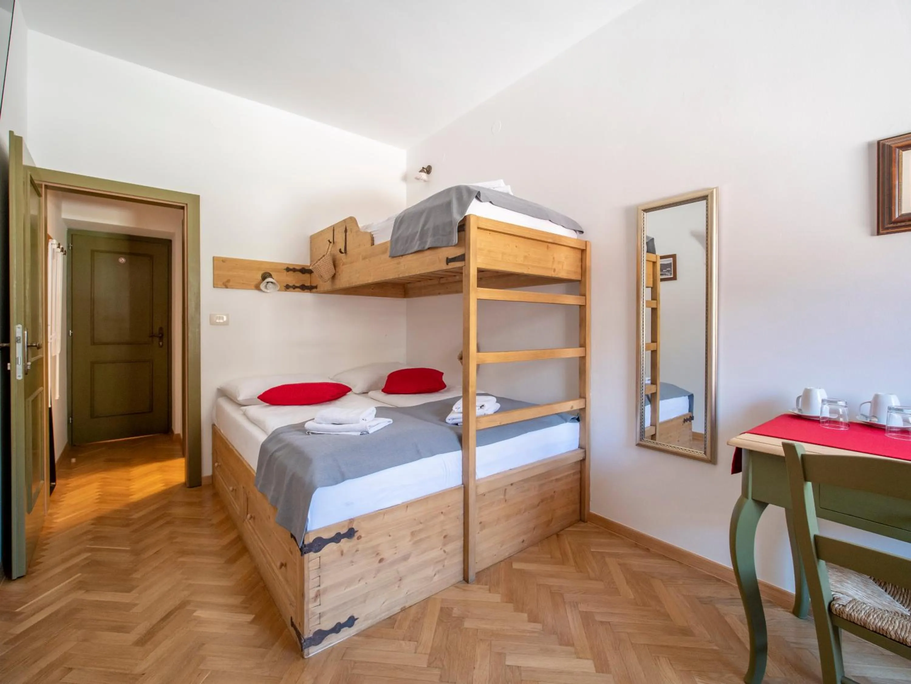 Bed in Berghi Hotel and Apartments
