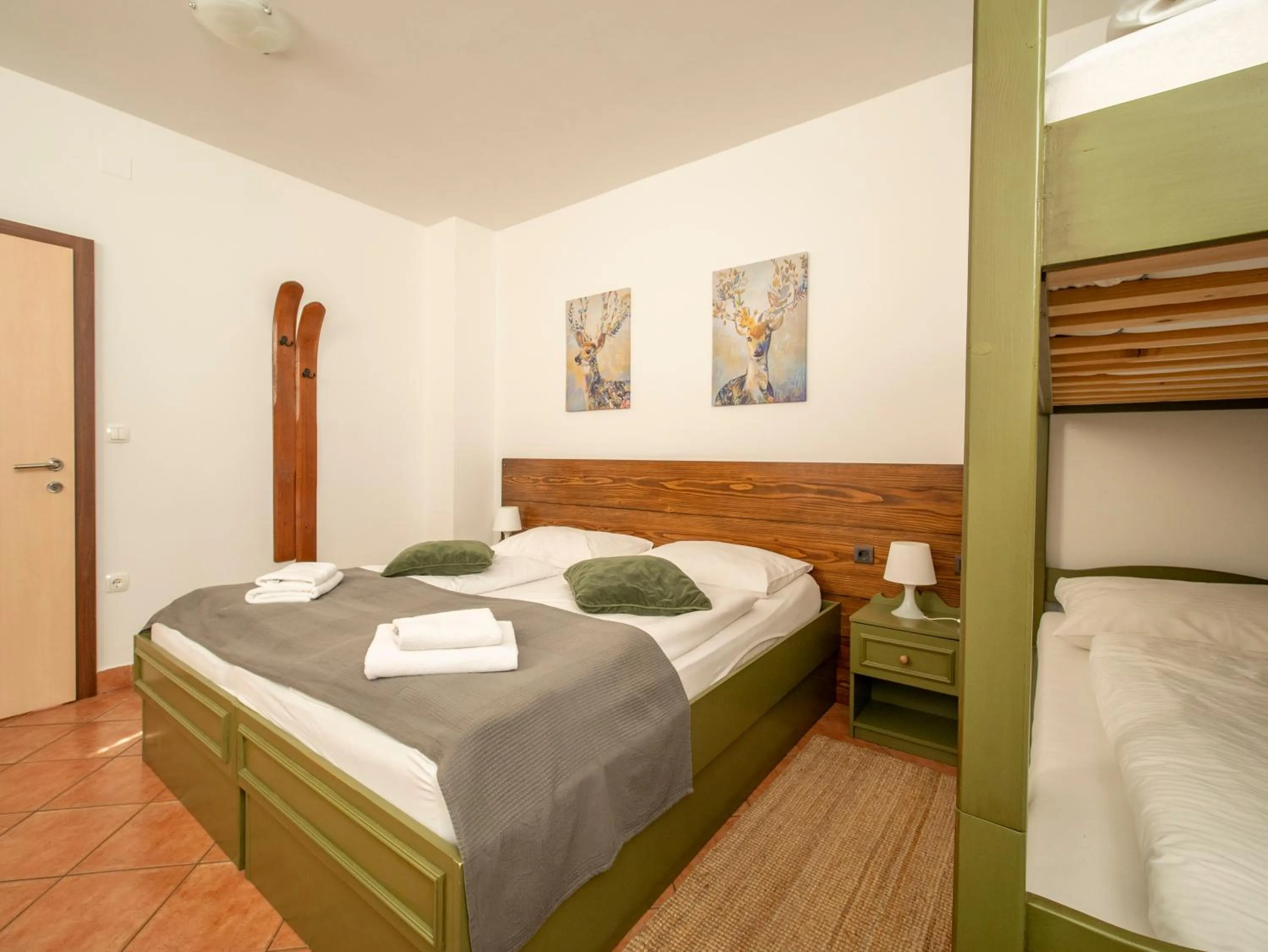Bed in Berghi Hotel and Apartments