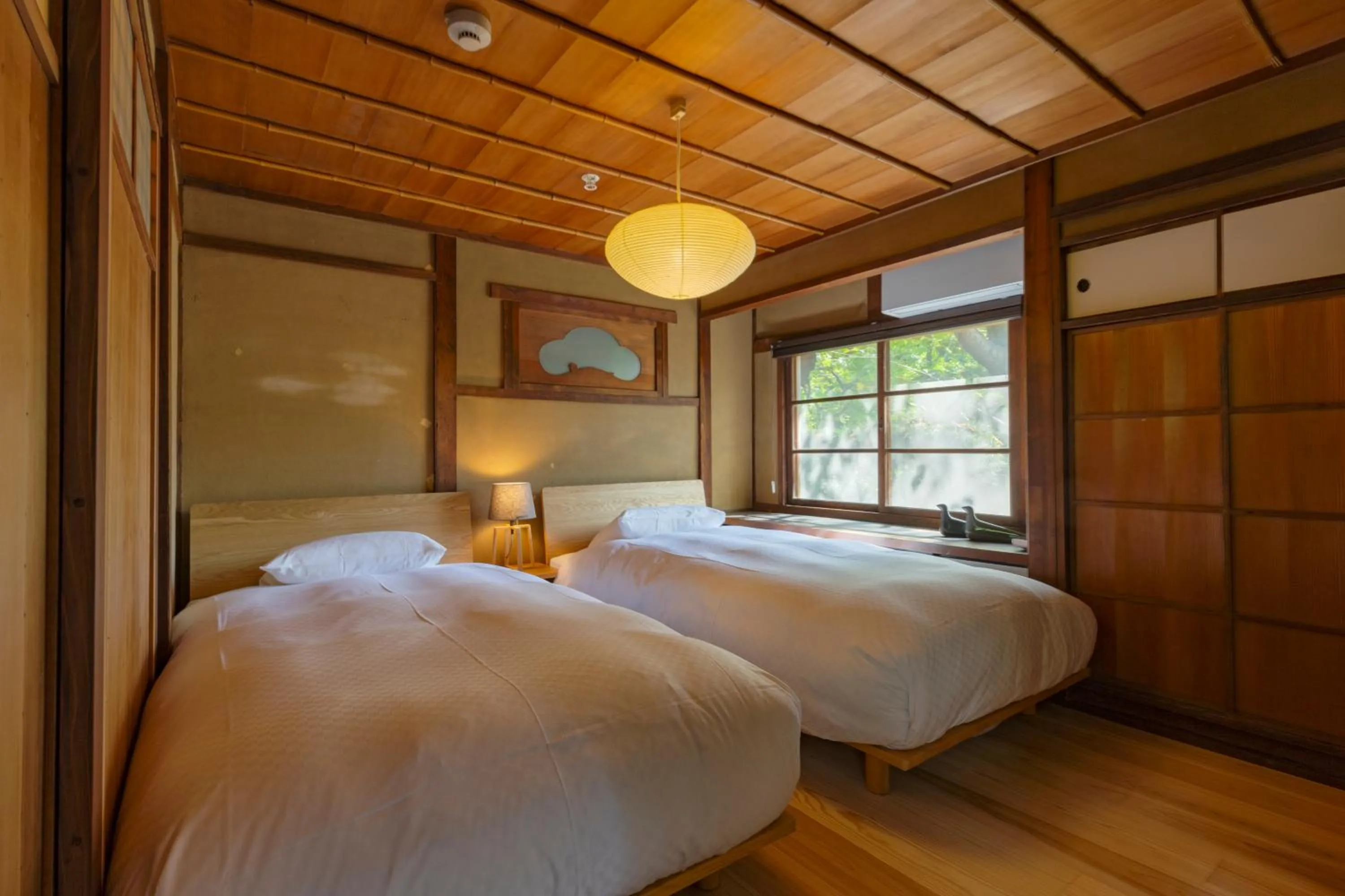 Bed in NIPPONIA HOTEL NARA NARAMACHI