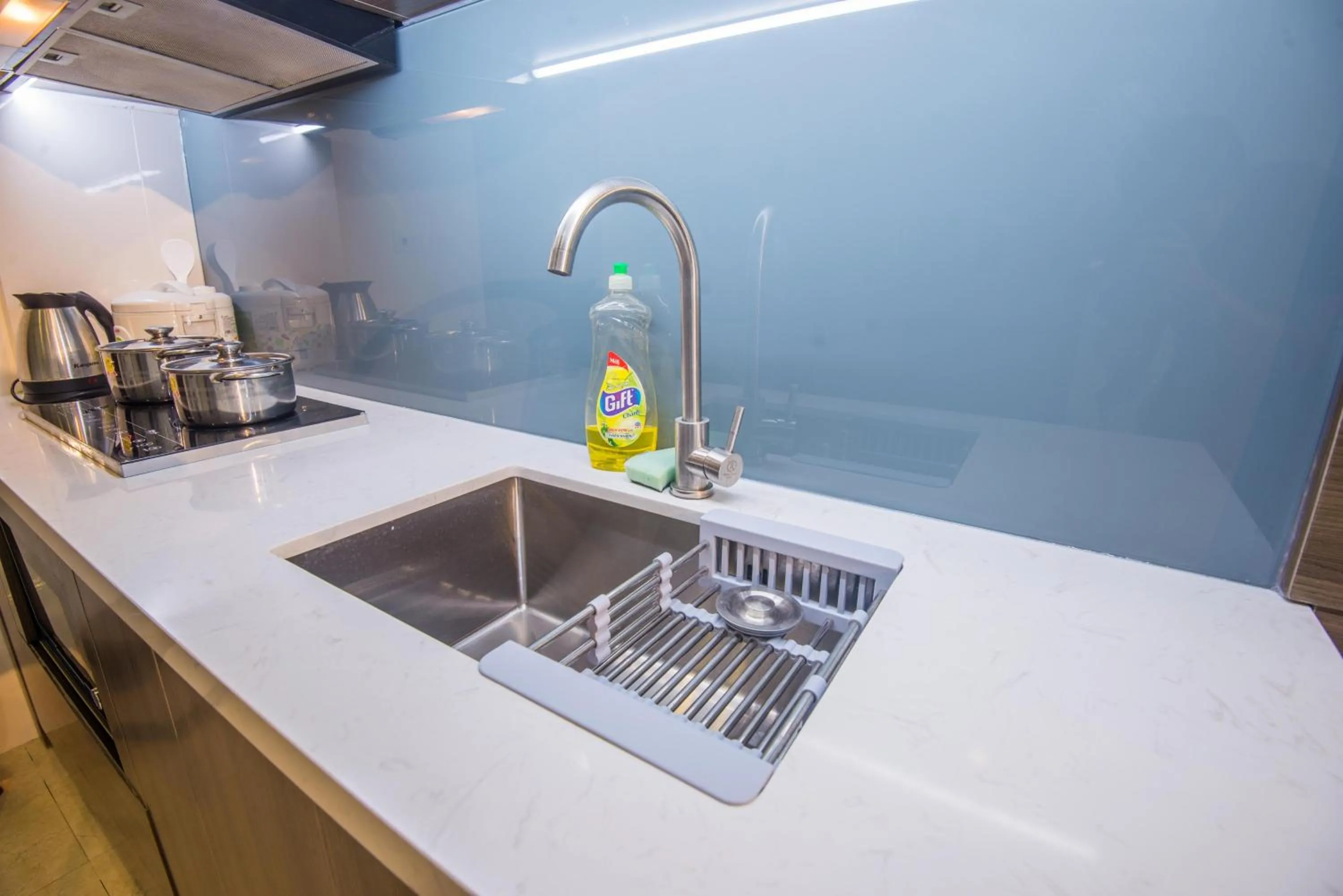 Kitchen or kitchenette in 22Housing luxury Hotel & Residence 39 Linh Lang