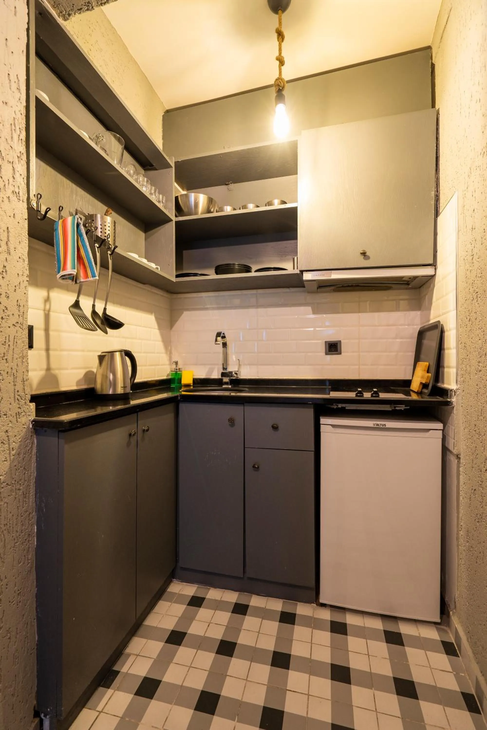 Kitchen or kitchenette in Cube Suites