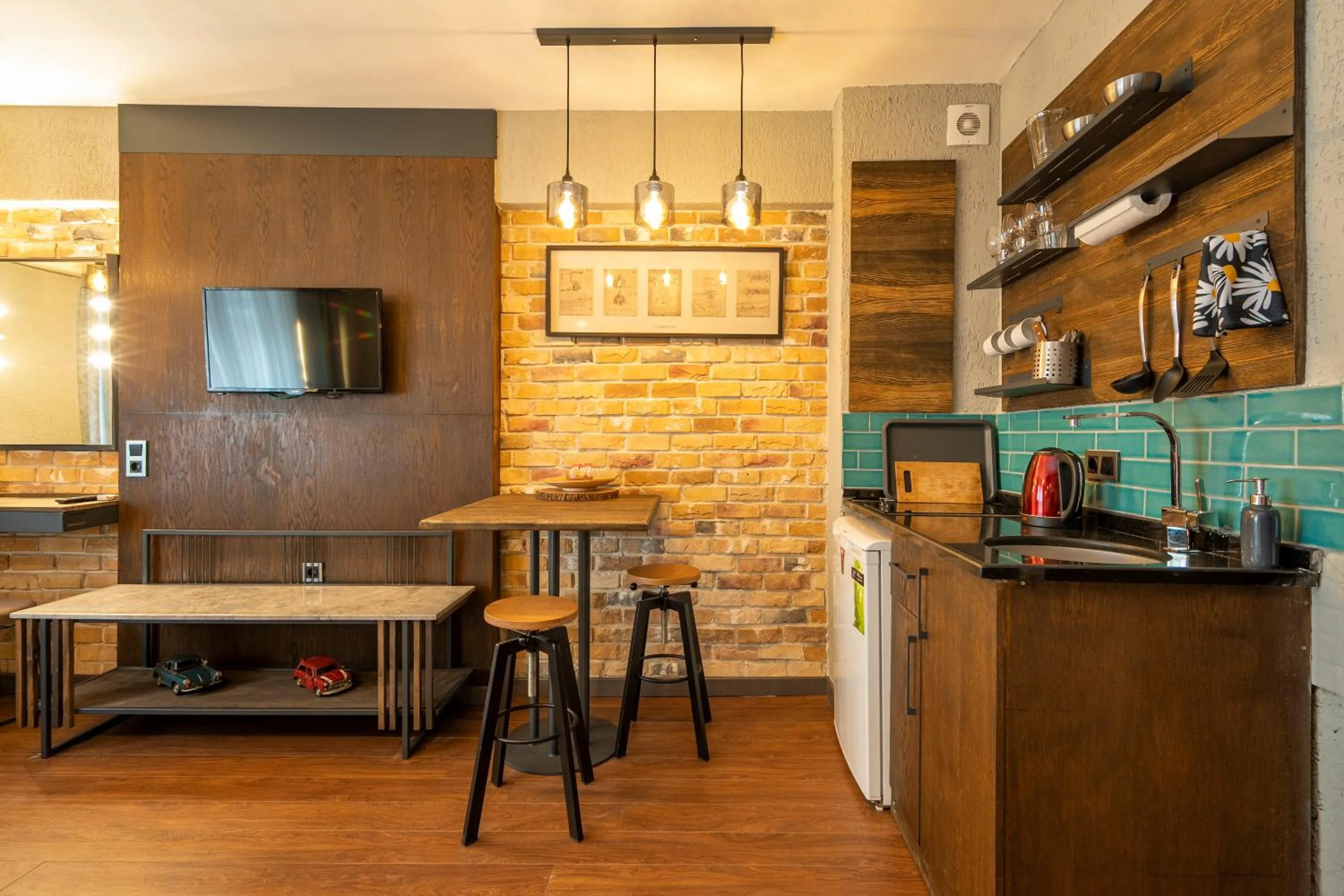 Kitchen or kitchenette in Cube Suites