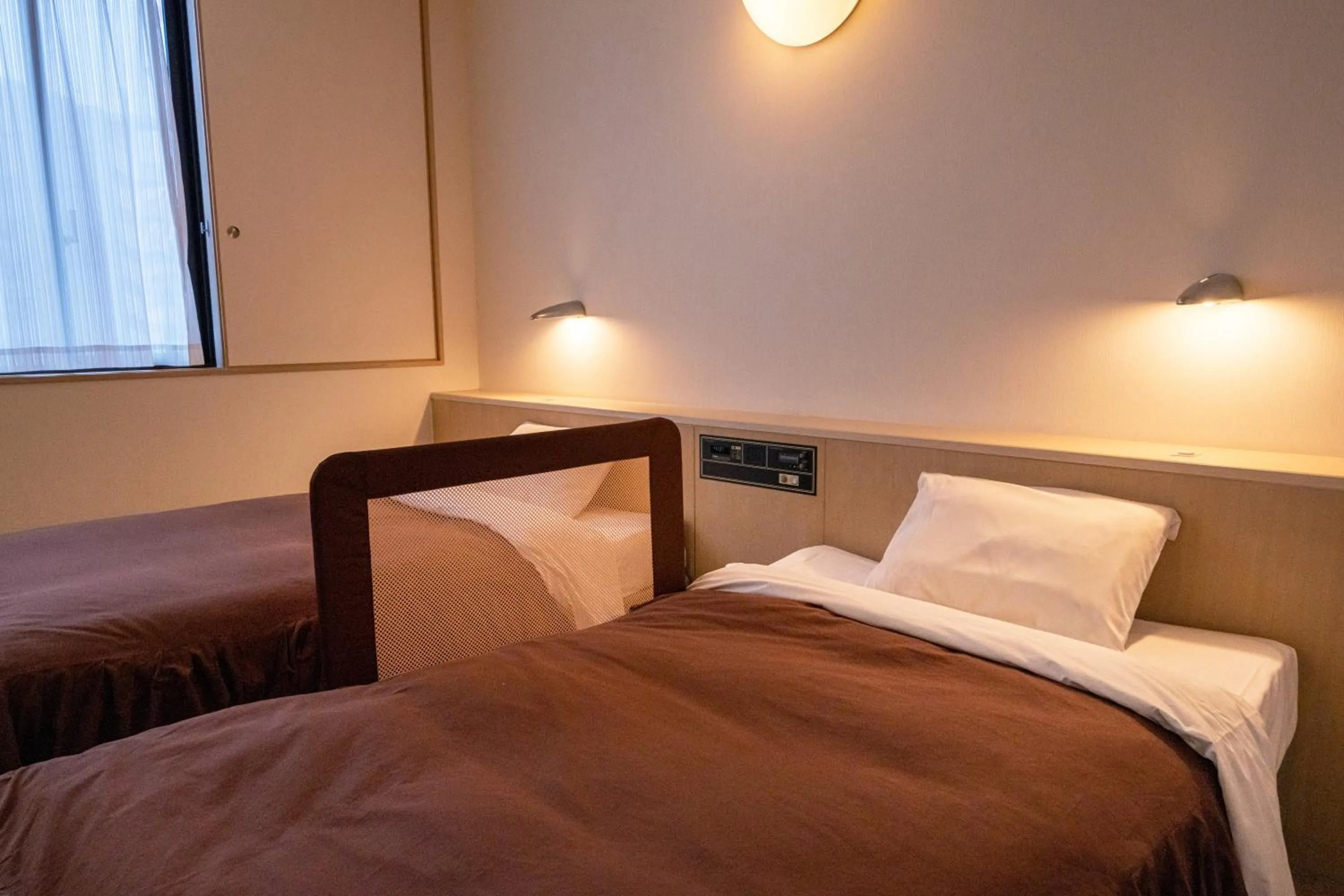 Bed in Chigusa Hotel