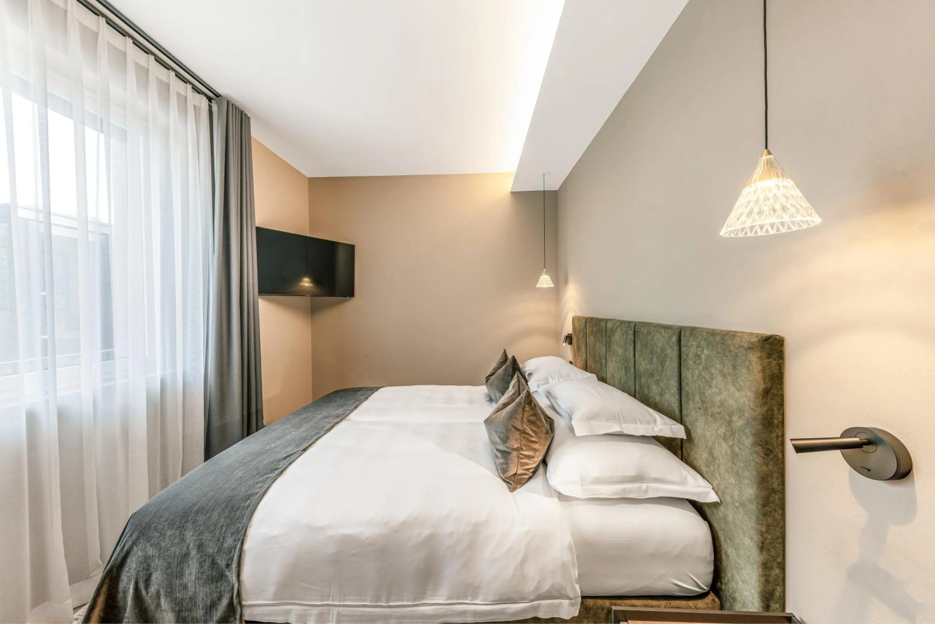 Photo of the whole room, Bed in Quellenhof Luxury Resort Lazise