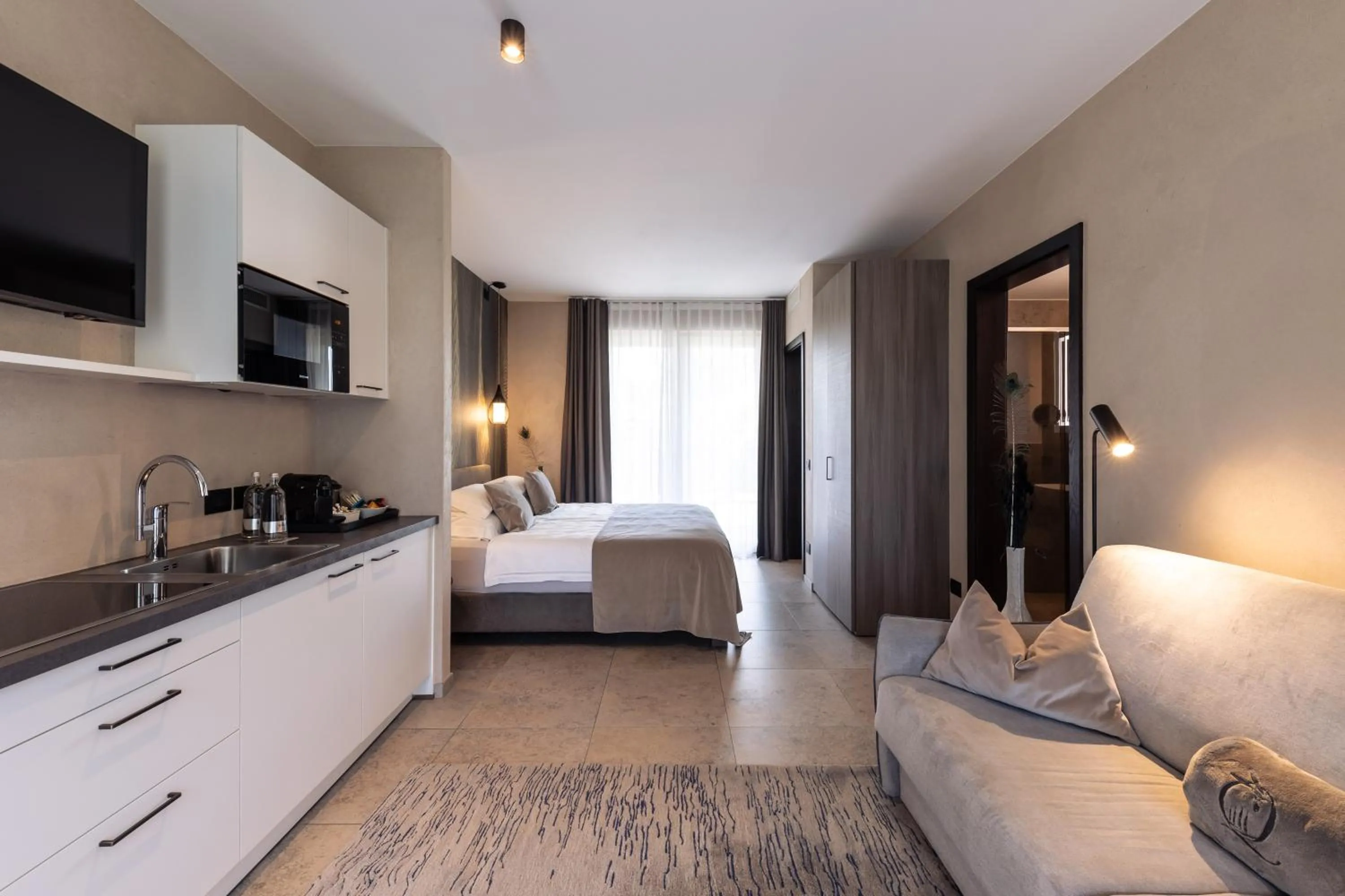 Bed in Quellenhof Luxury Resort Lazise