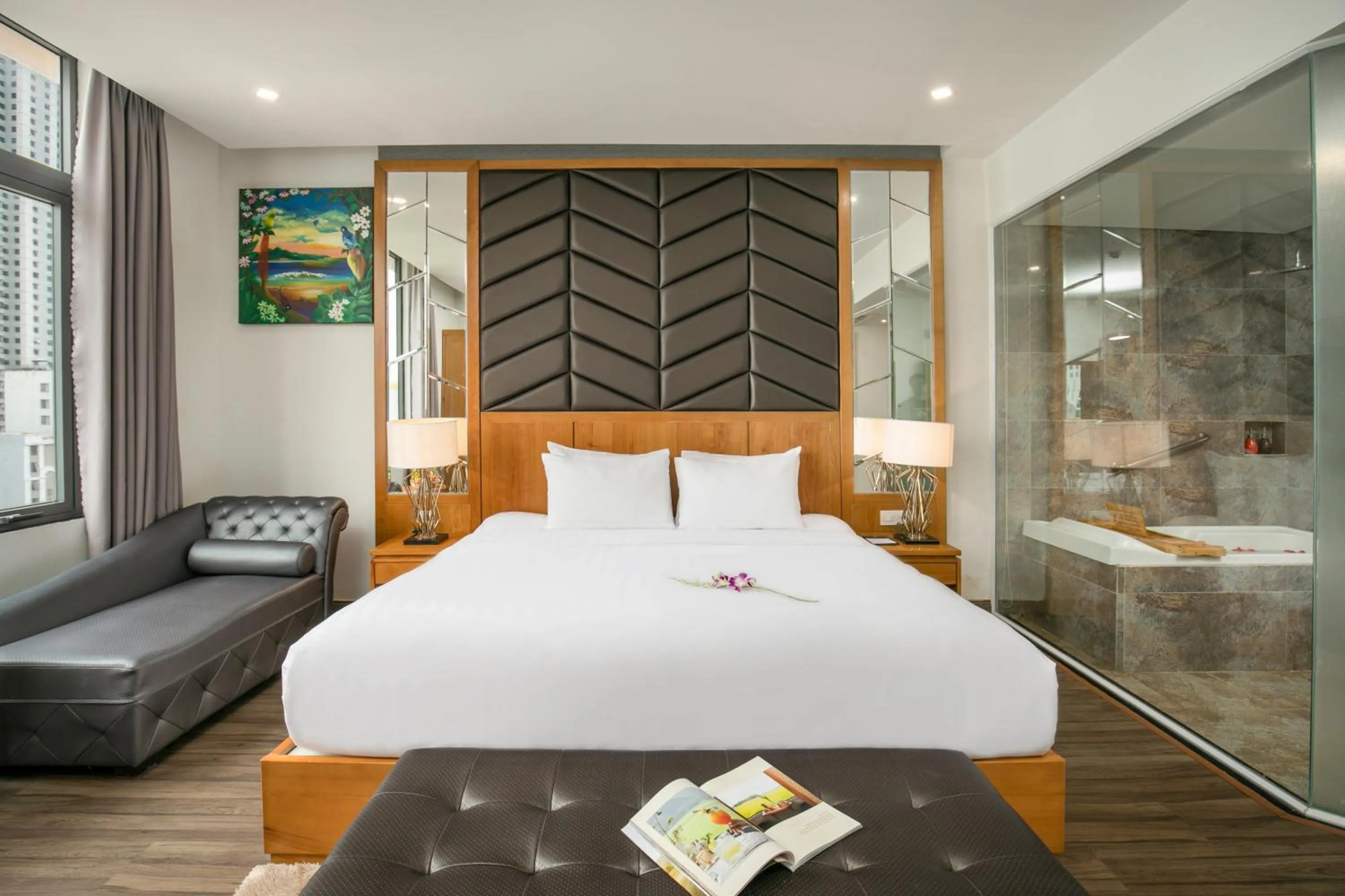 Bed in Grand Sunrise Boutique Hotel