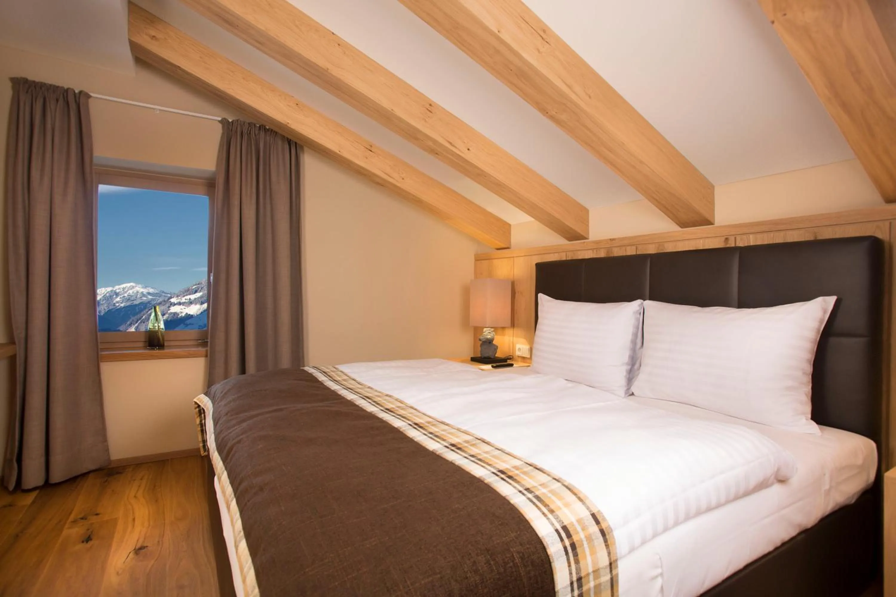 Bed in Das gemütliche Dorfhotel Kaltenhauser