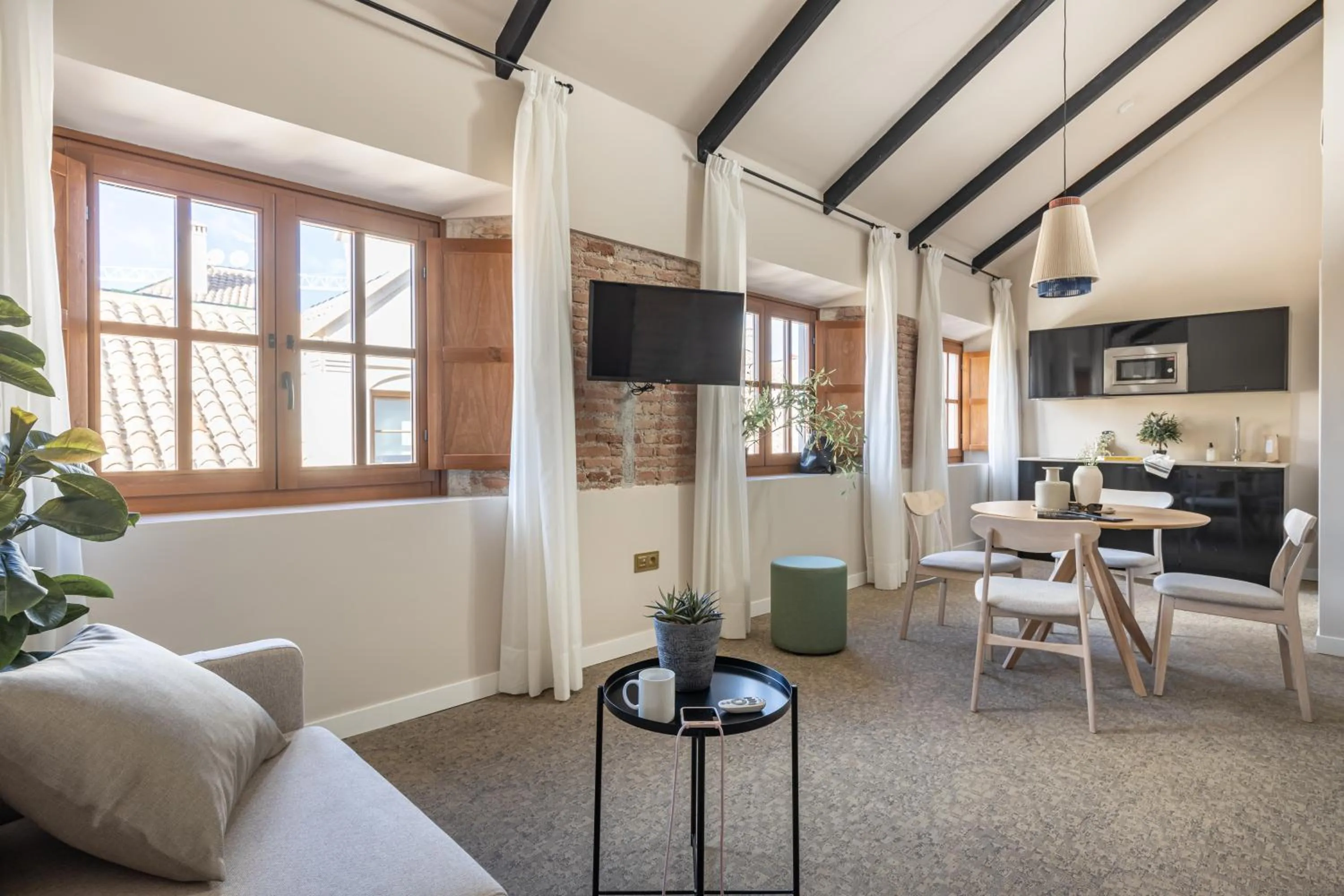 Seating area in Líbere Málaga Teatro Romano