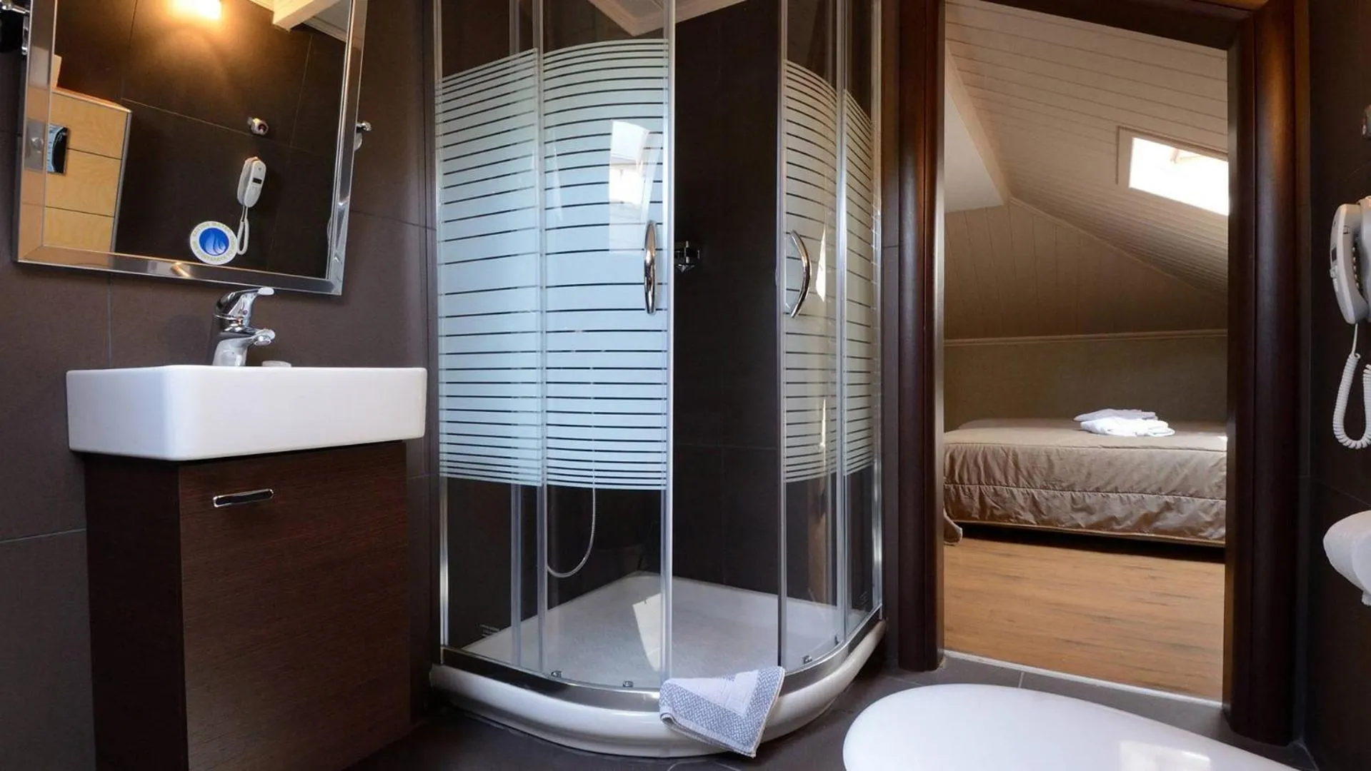 Bathroom, Bed in Atrium Hotel Thassos