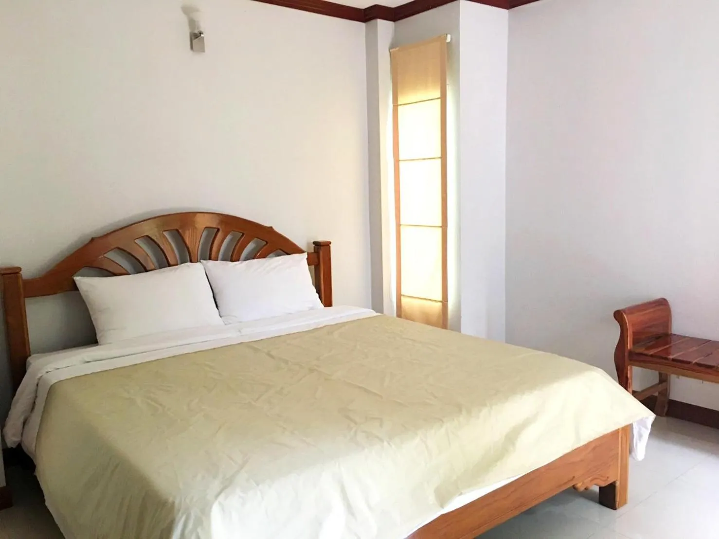 Bed in นาหินลาดรีสอร์ท Nahinlad Resort