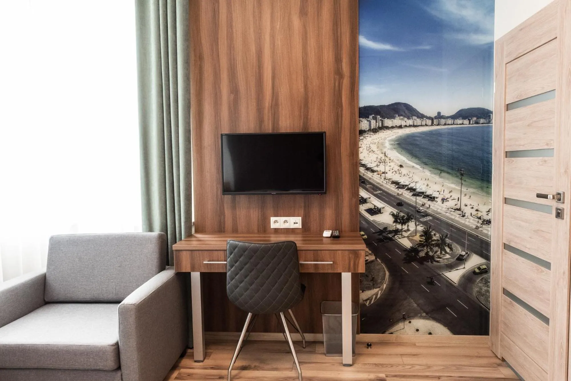 Communal lounge/ TV room in Metropolis Apartamenty Centrum