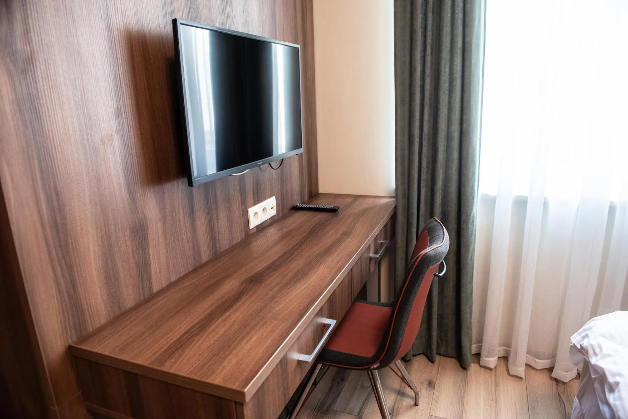 Communal lounge/ TV room in Metropolis Apartamenty Centrum