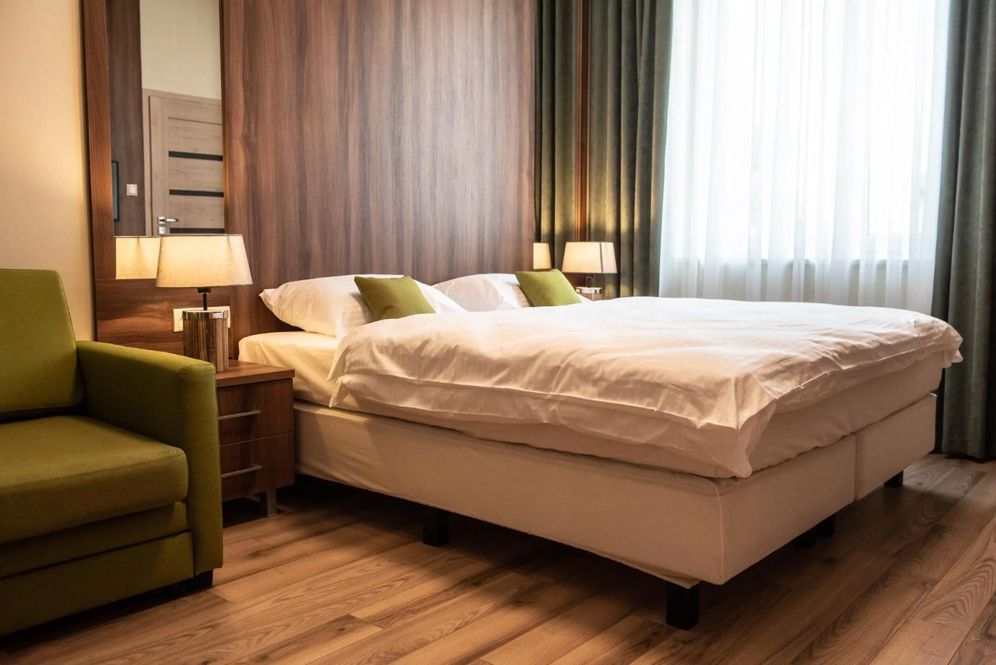 Bed in Metropolis Apartamenty Centrum