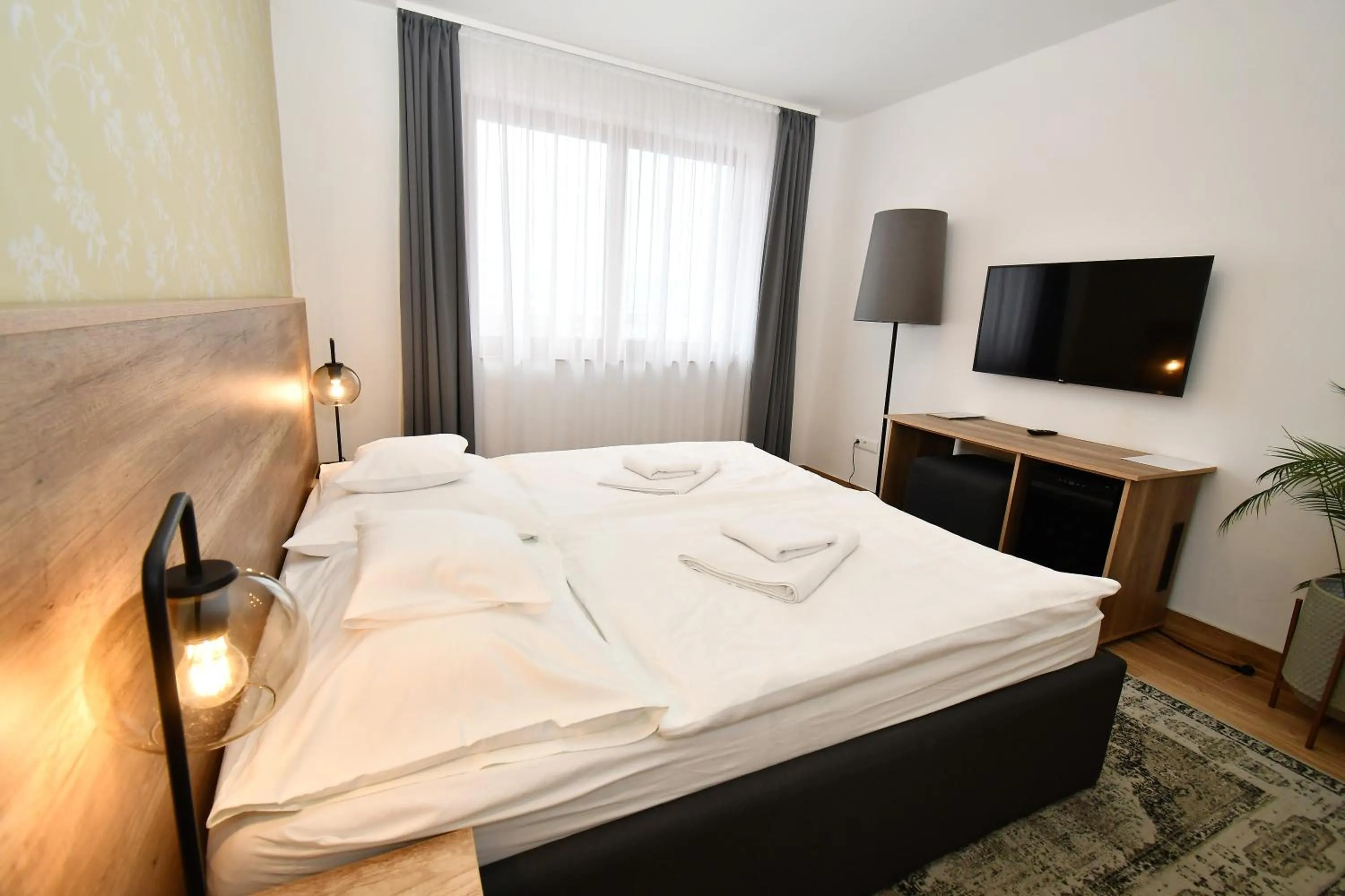 Photo of the whole room, Bed in Angyal Borászat és Panzió