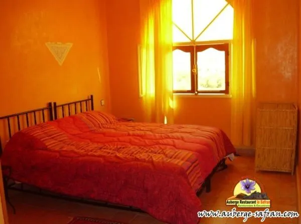 Photo of the whole room, Bed in Auberge Restaurant le Safran