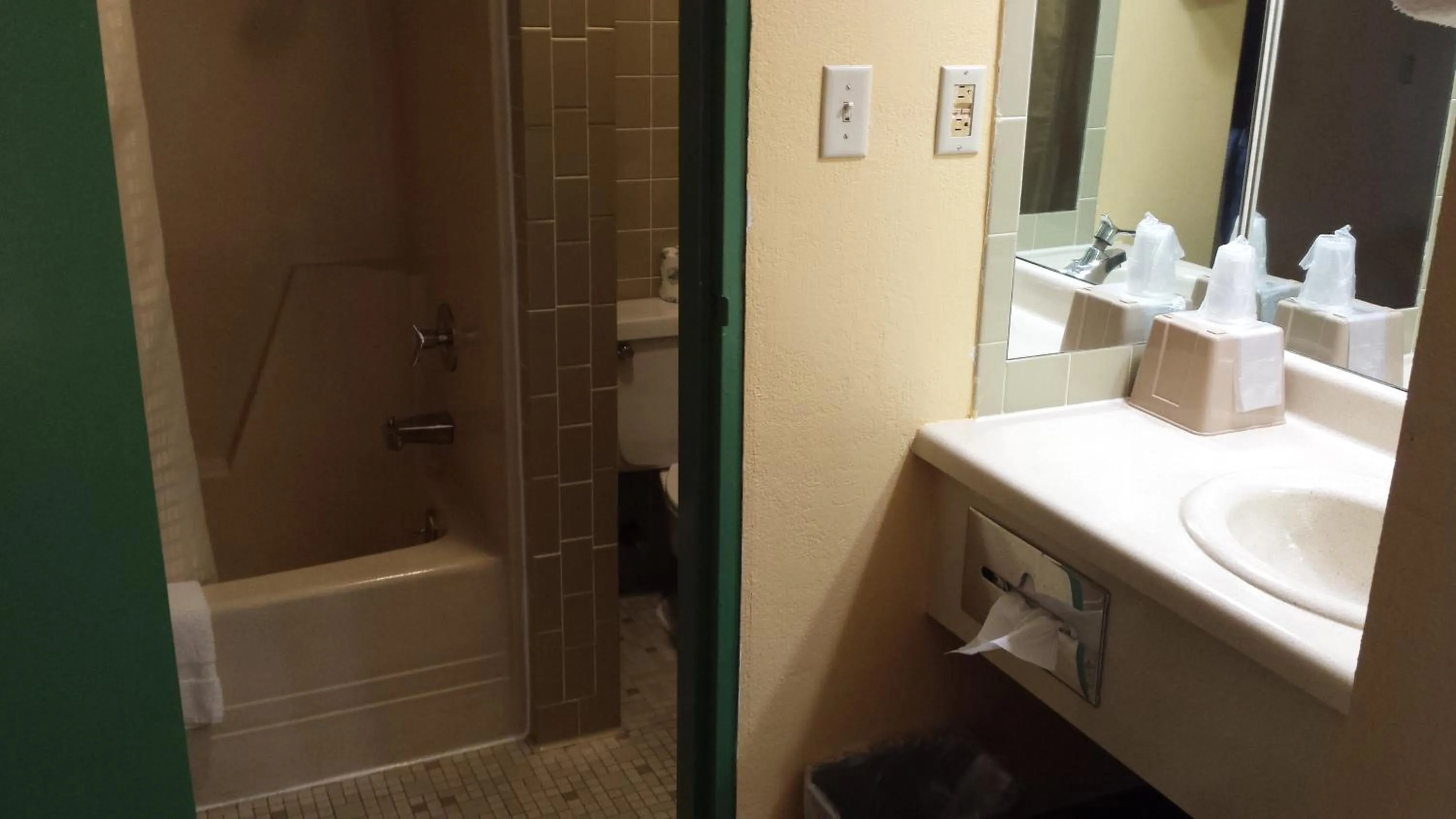 Bathroom in Family Budget Inn Harrison