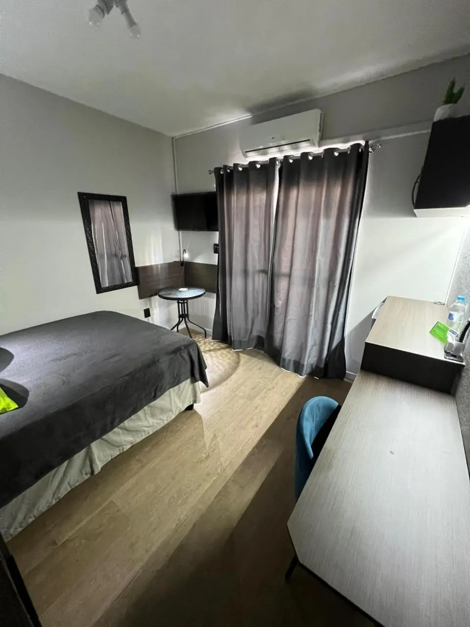 Bed in Rezende Suítes