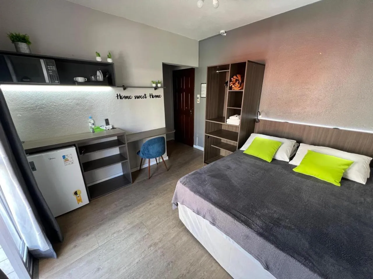 Bed in Rezende Suítes