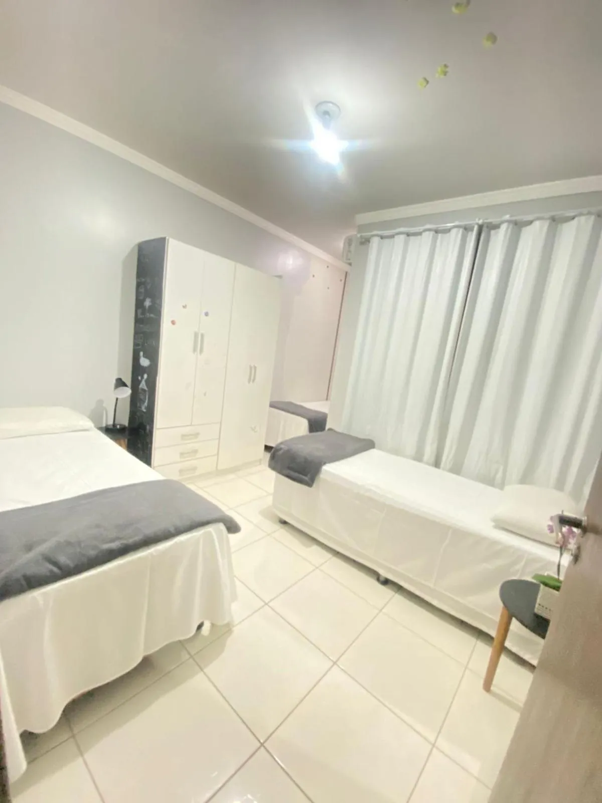 Bed in Rezende Suítes