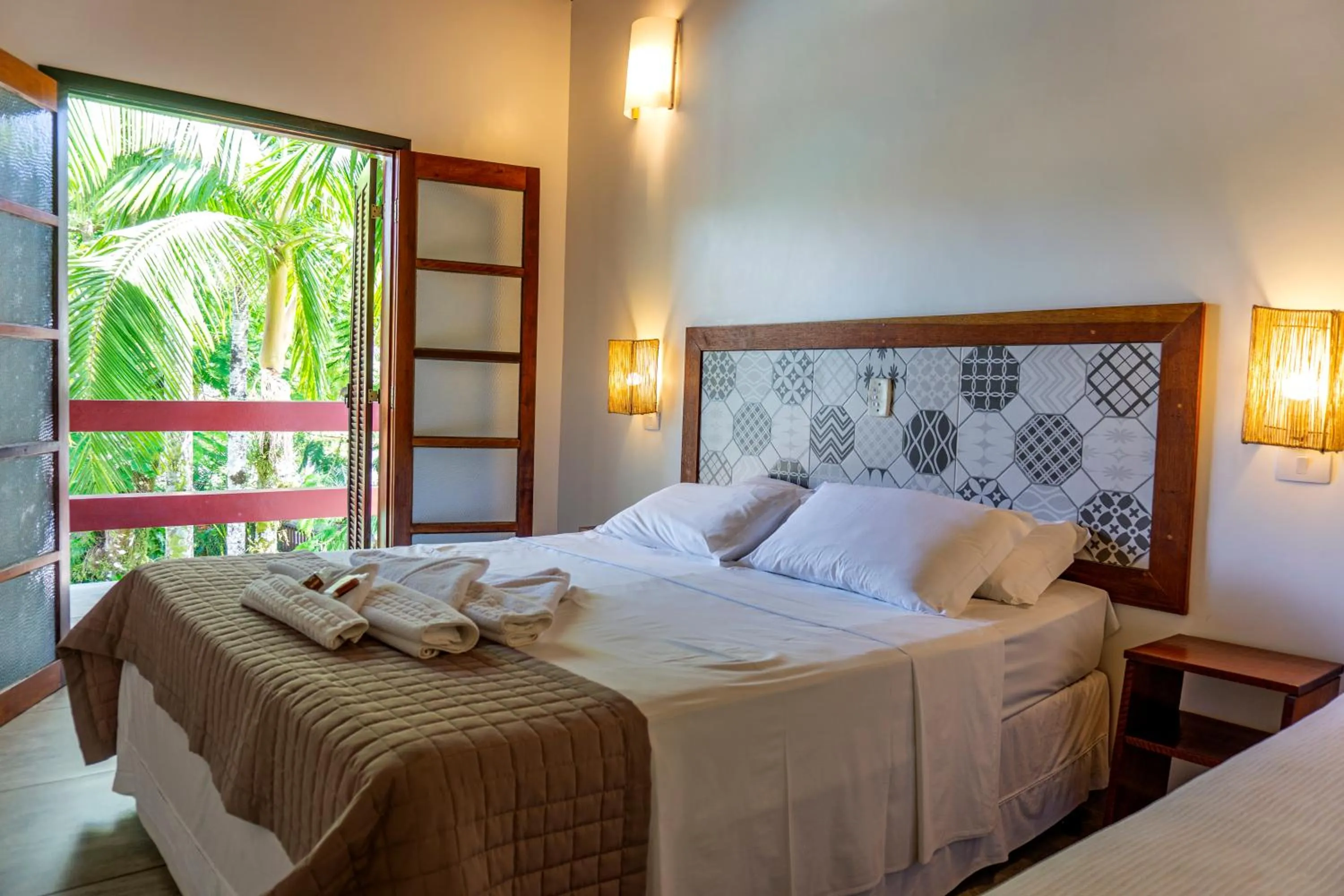 Bed in Pousada Casarão