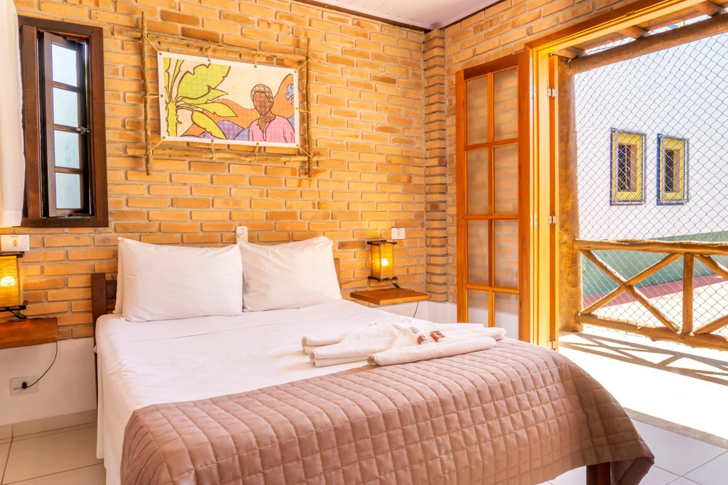 Bed in Pousada Casarão